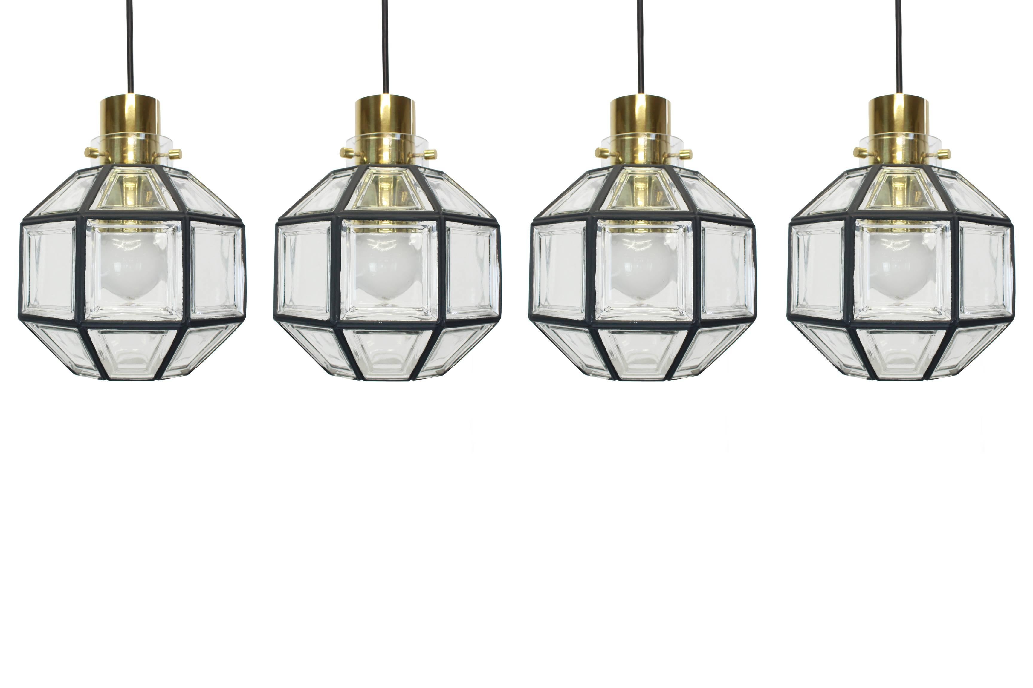 Set of Four Iron and Clear Glass Pendant Lights by Limburg, Germany, 1960s In Excellent Condition In Aachen, NRW