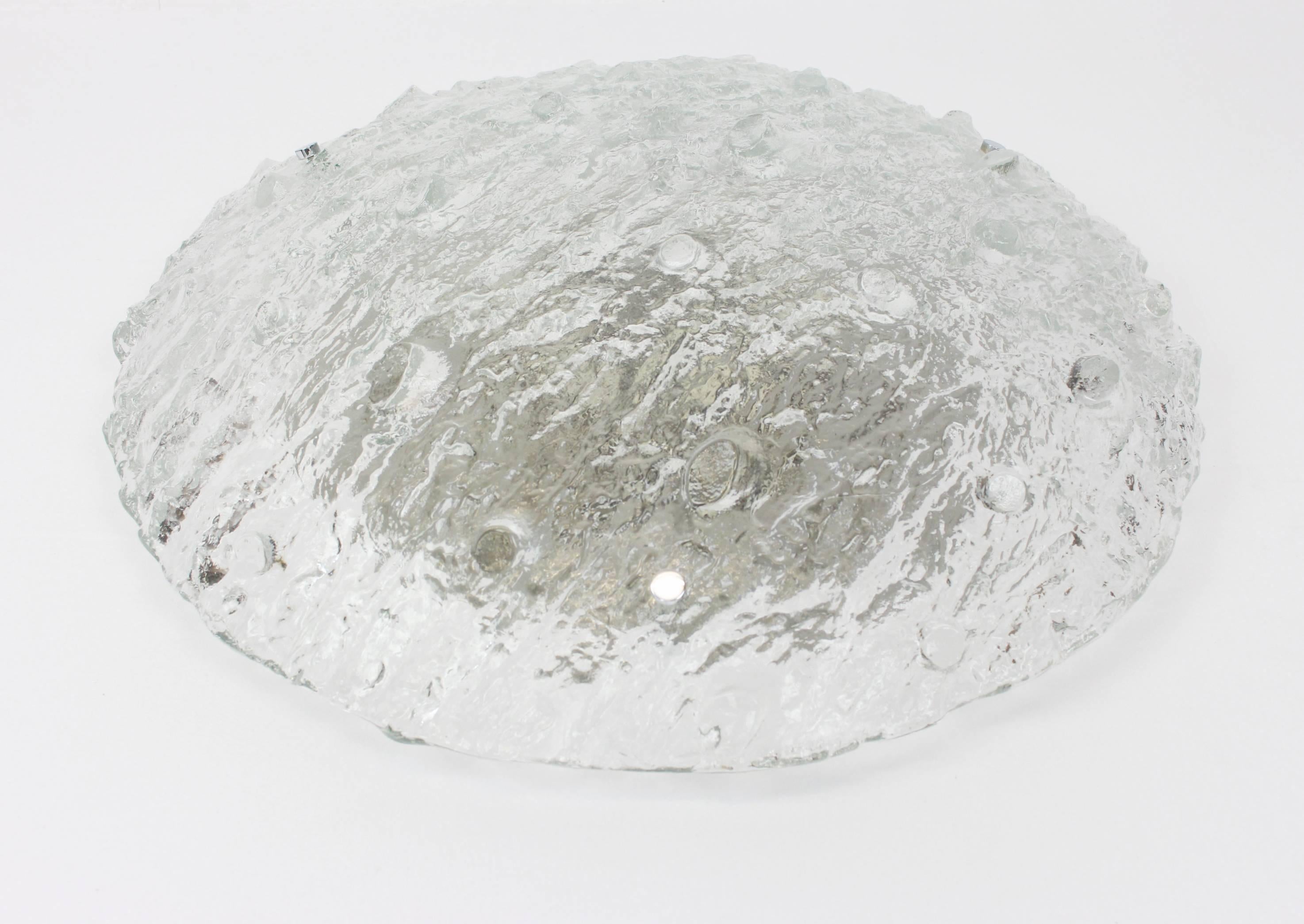 A wonderful Murano glass flush mount light made Josef Brumberg, Germany, 1970s.
Thick textured Murano Glass fixtured metal base with three chrome holders.

High quality and in very good condition. Cleaned, well-wired, and ready to use. 

The fixture