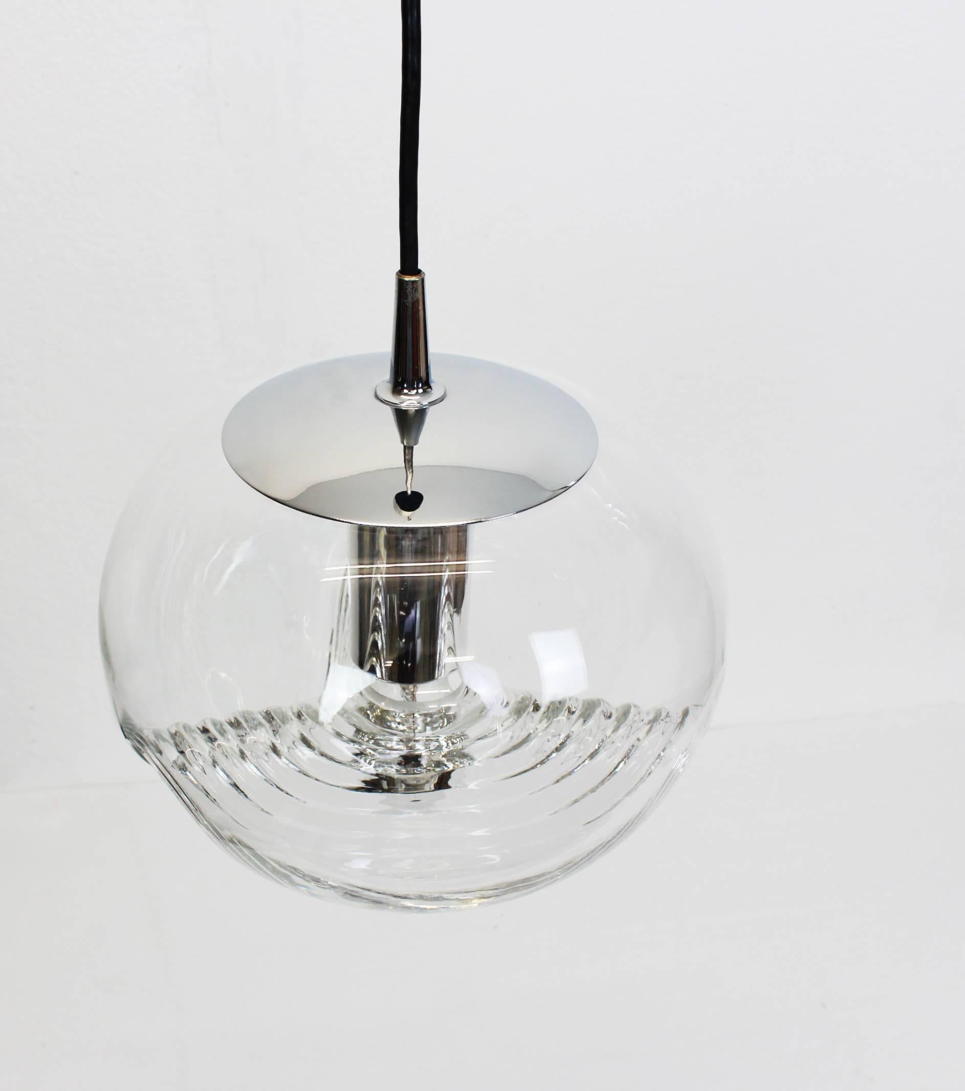 A special round Biomorphic glass pendant designed by Koch & Lowy for Peill & Putzler, manufactured in Germany, circa the 1970s.

High quality and in very good condition. Cleaned, well-wired and ready to use. 

The fixture requires 1x E27 Standard