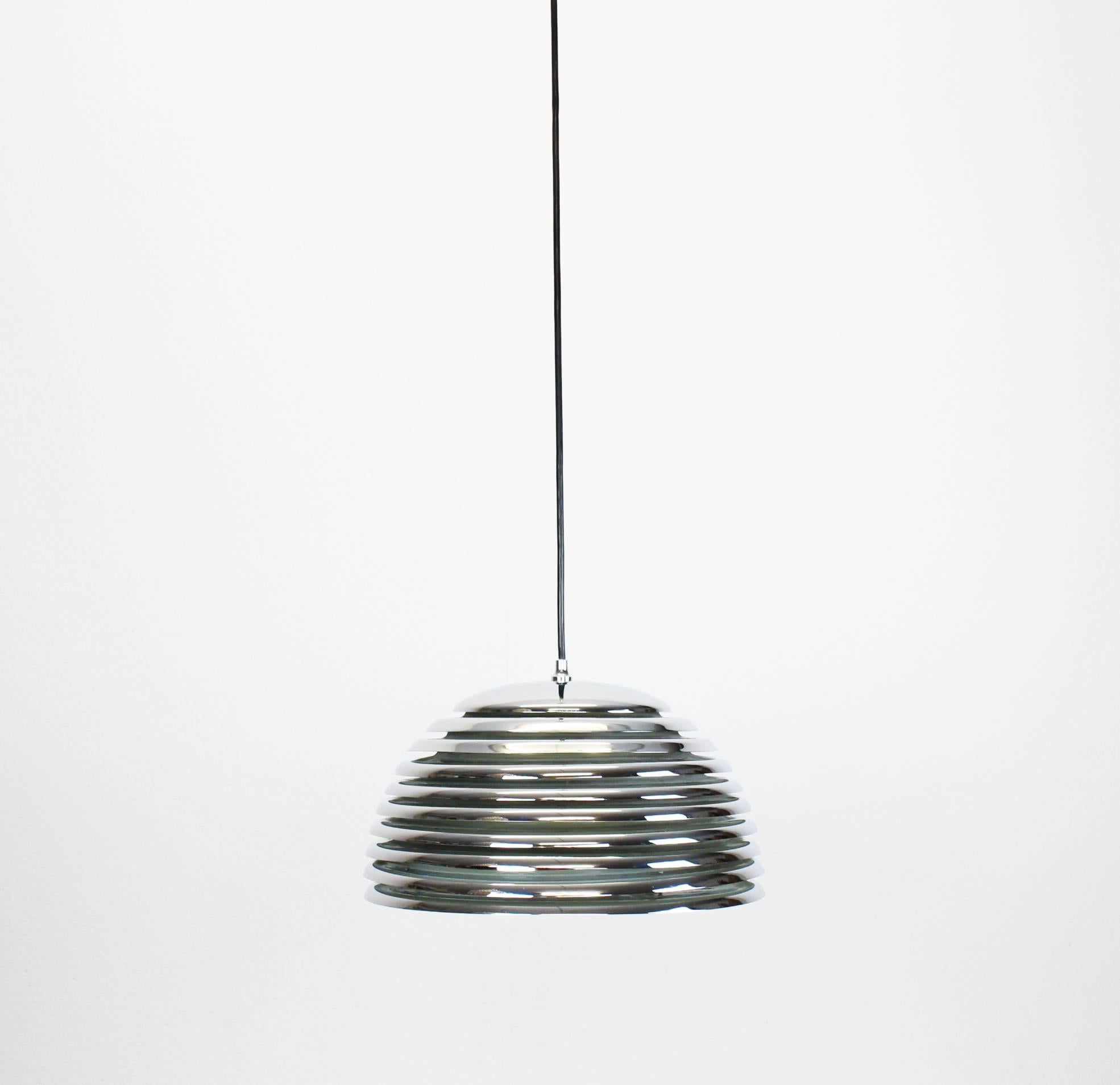 Very nice pendant light with chrome rings, designed by Kazuo Motozawa for Staff Leuchten manufactured in Germany, circa the 1970s.

High quality and in very good condition. Cleaned, well-wired and ready to use. 

The fixture requires 1 x E27