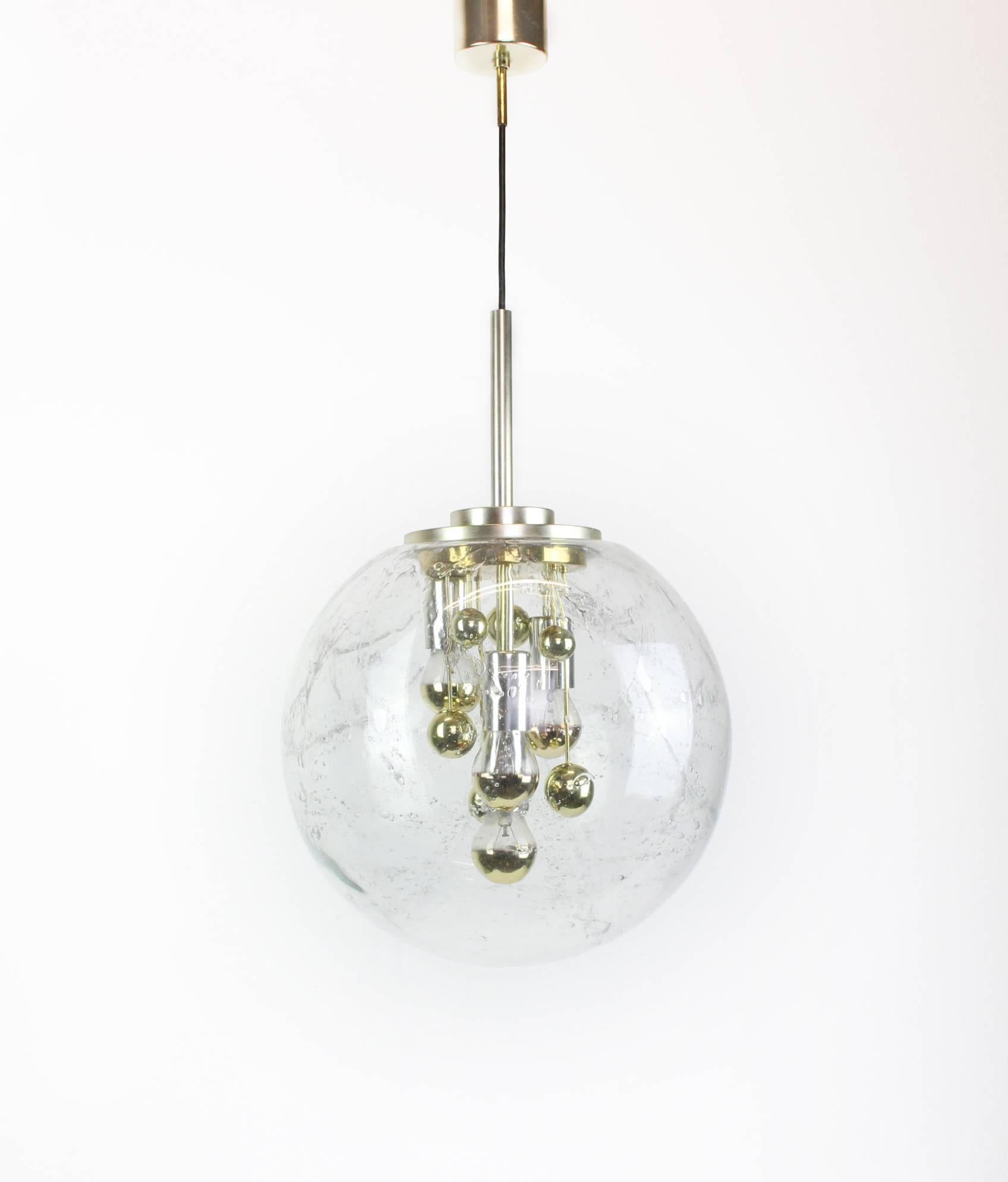 Doria ceiling light with large volcanic crystal glass dome on golden aluminum base. 

Between the four bulbs are currently six ball reflectors, the so-called. 