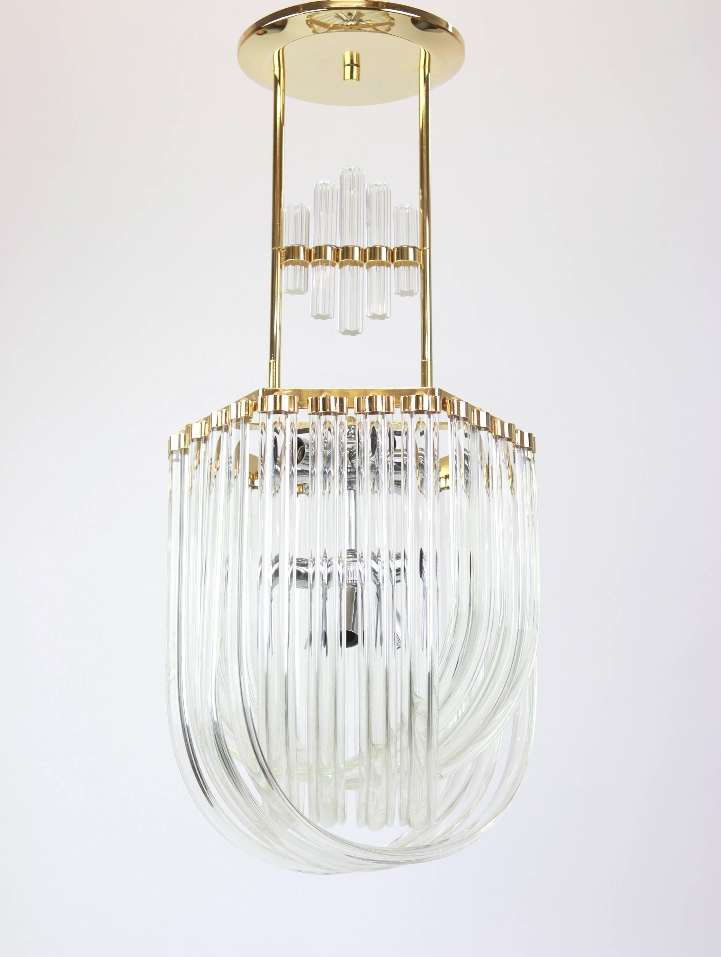 Curved glass pendant light in Venini style in a brass frame in a basket-shape.
Sockets: It needs 12 x E14 candelabra bulbs. (40 watt each) and function on voltage from 110 till 240 volts (for USA - UK - etc ...)
Very good original condition. Small