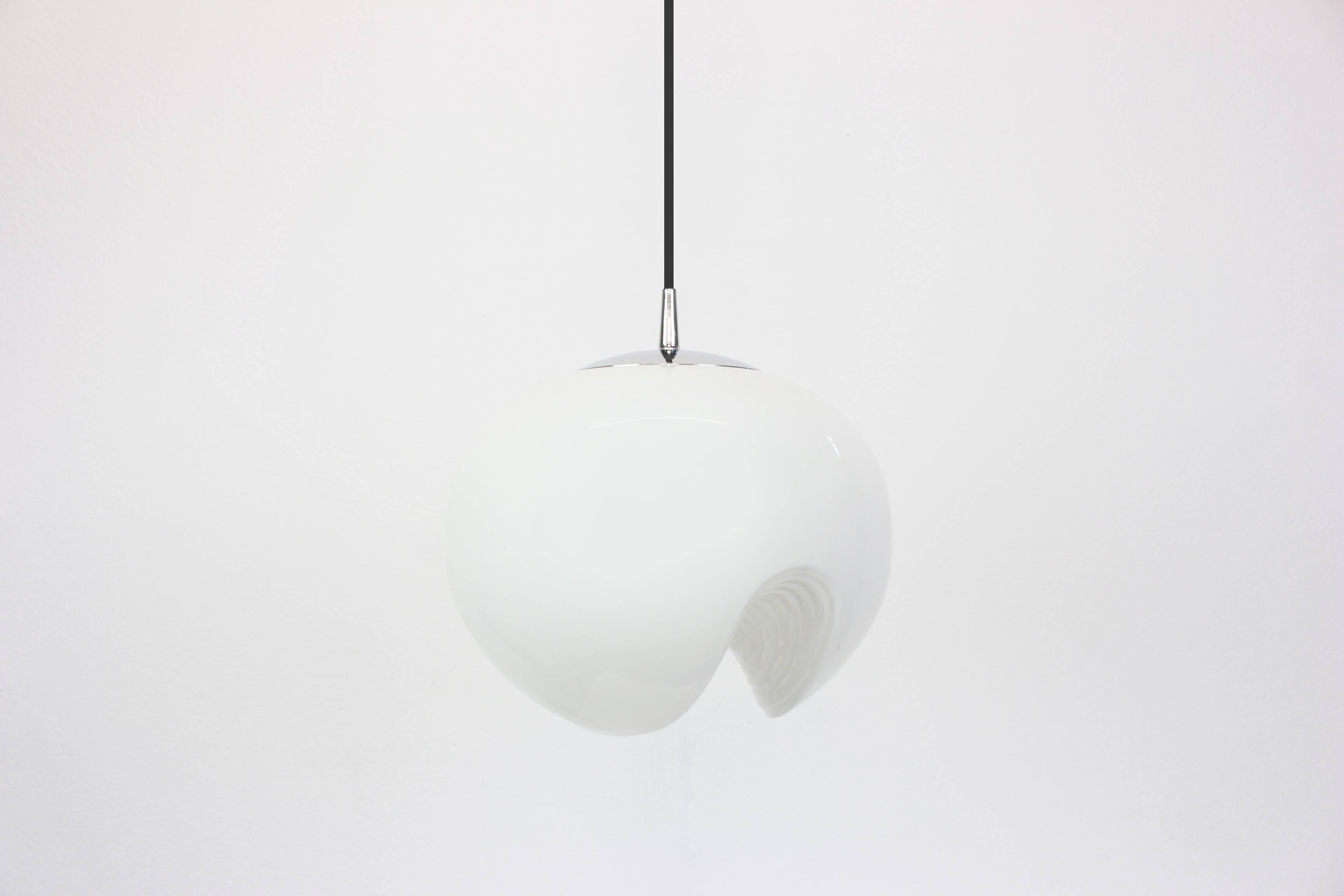 A special round biomorphic white molded glass pendant designed by Koch & Lowy for Peill & Putzler, manufactured in Germany, circa 1970s.

High quality and in very good condition. Cleaned, well-wired and ready to use. 

The fixture requires 1