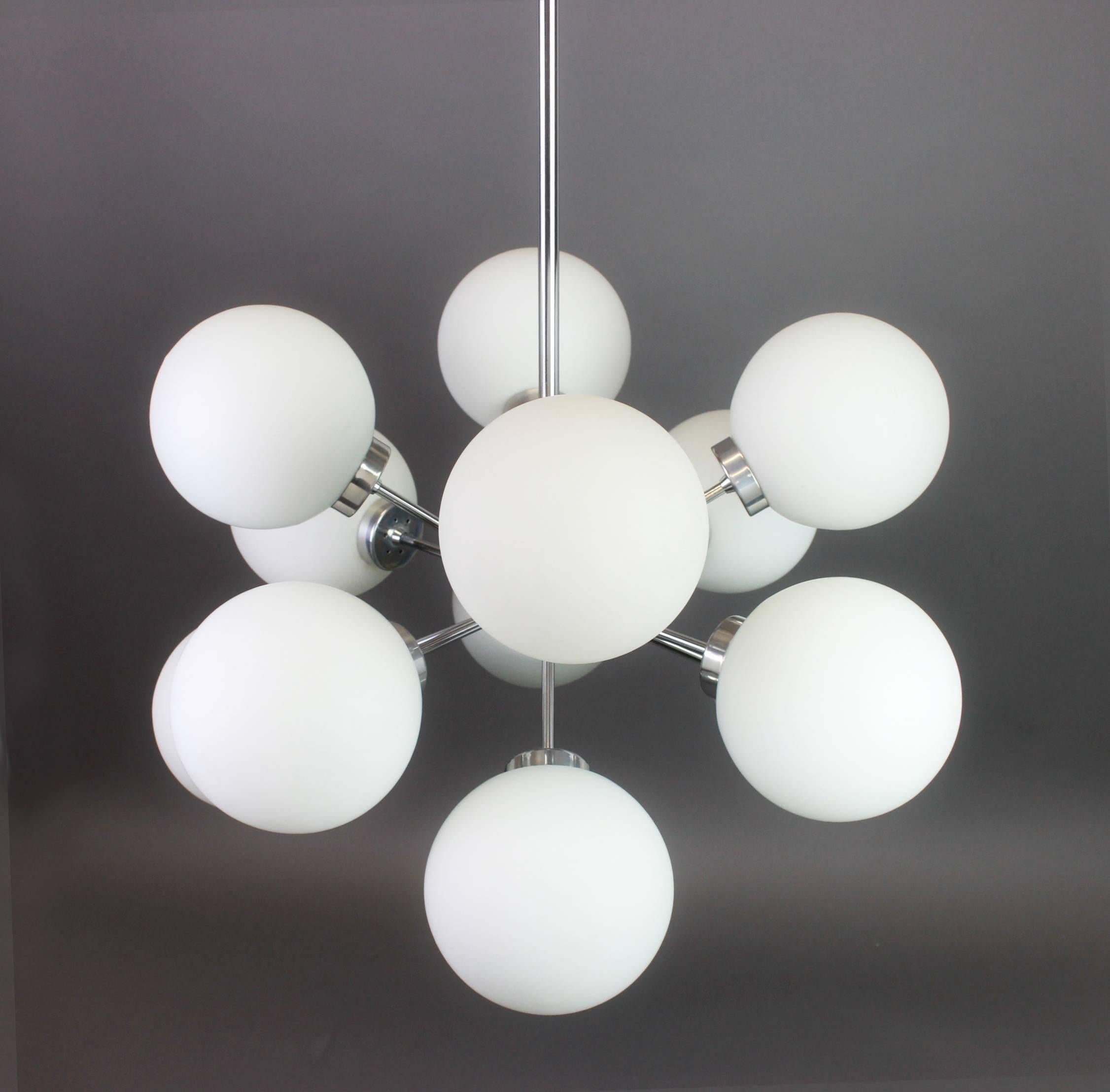Stunning 12-arm Sputnik Chandelier with 12 opal glass shades by Richard Essig, Germany, 1960s
Dimensions
35.43 in.H - 90 cmH
Diameter
21.65 in. (55 cm)
It needs 12 candelabra size bulbs up to 40 watts each and function on voltage from 110 till 240