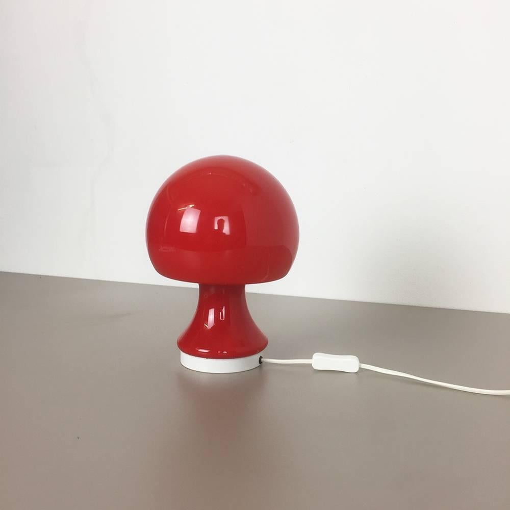 Article:

Mushroom desk lamp

Producer:

Peill & Putzler, Germany

Age:

1960s


Description:

Original desktop light made in the 1960s by Peil & Putzler in Germany. The shade in made of red glass in form of a mushroom, with diameter
