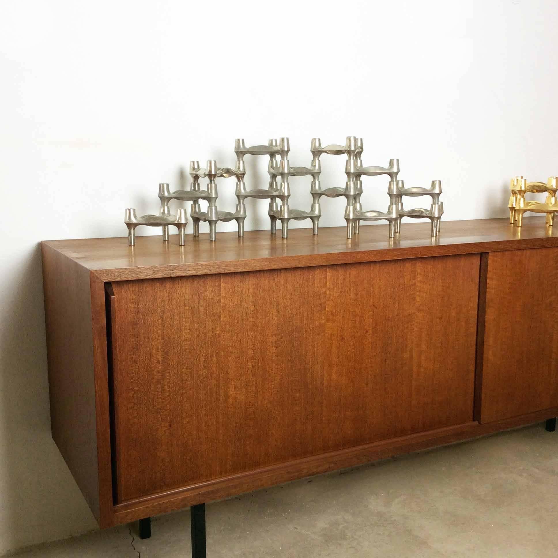 Article: 14 metal candleholder elements 

Producer: BMF Nagel, Germany 

Design: Ceasare Stoffi, 1960s 


This original vintage set of 14 metal candleholders, was produced in the 1970s in Germany by BMF Nagel. Due to the three stacking option