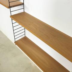 Bokhyllan "The Ladders Shelf" Elm String Wall Unit Designed by Nisse Strinning