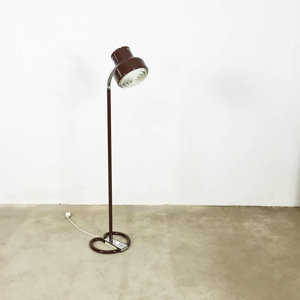 Floor light.

Designed by Anders Pehrson.

Producer Atelje Lyktan, Sweden,

1970s.

This floor lamp was designed by Anders Pehrson and manufactured by Atelje Lyktan in the 1970s in Sweden. It is made from brown lacquered metal and features a