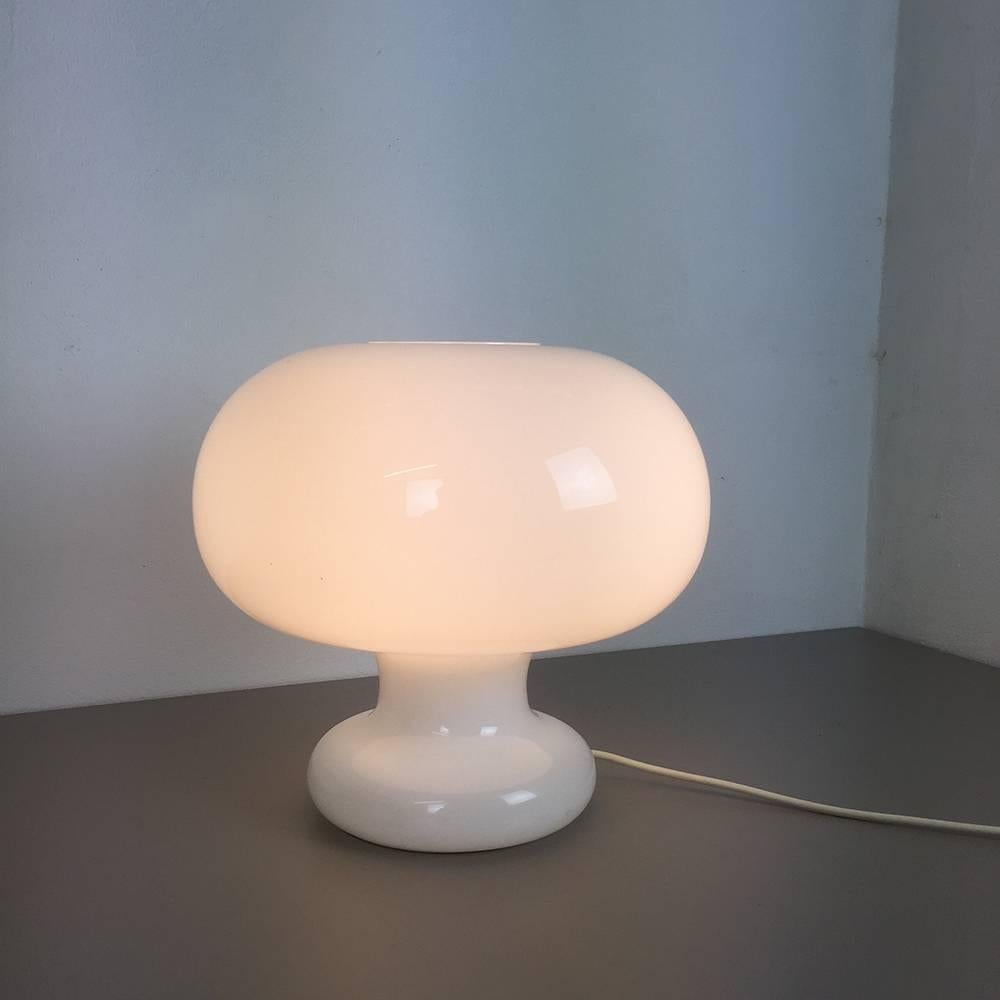Glass table light, 

produced by Cosack Lights,

1970s.

This original vintage table light made of high quality handblown glass was made by German premium light producer Cosack in the 1970s. this table light is completely formed of one