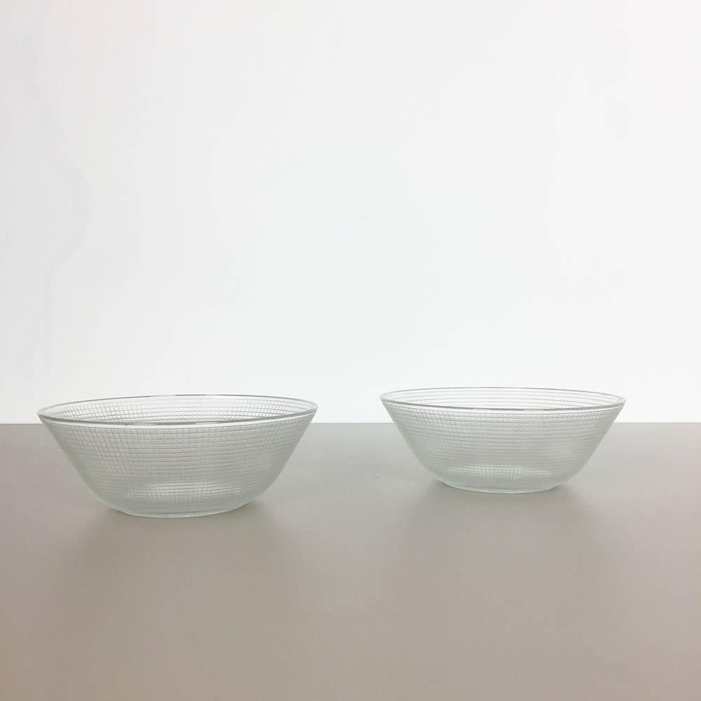 Article:

Set of two glass shells


Producer:

WMF, Germany


Design:

Prof. Wilhelm Wagenfeld Bauhaus 



Decade:

1950s-1960s


Original vintage 1960s set of two glass shell of the 