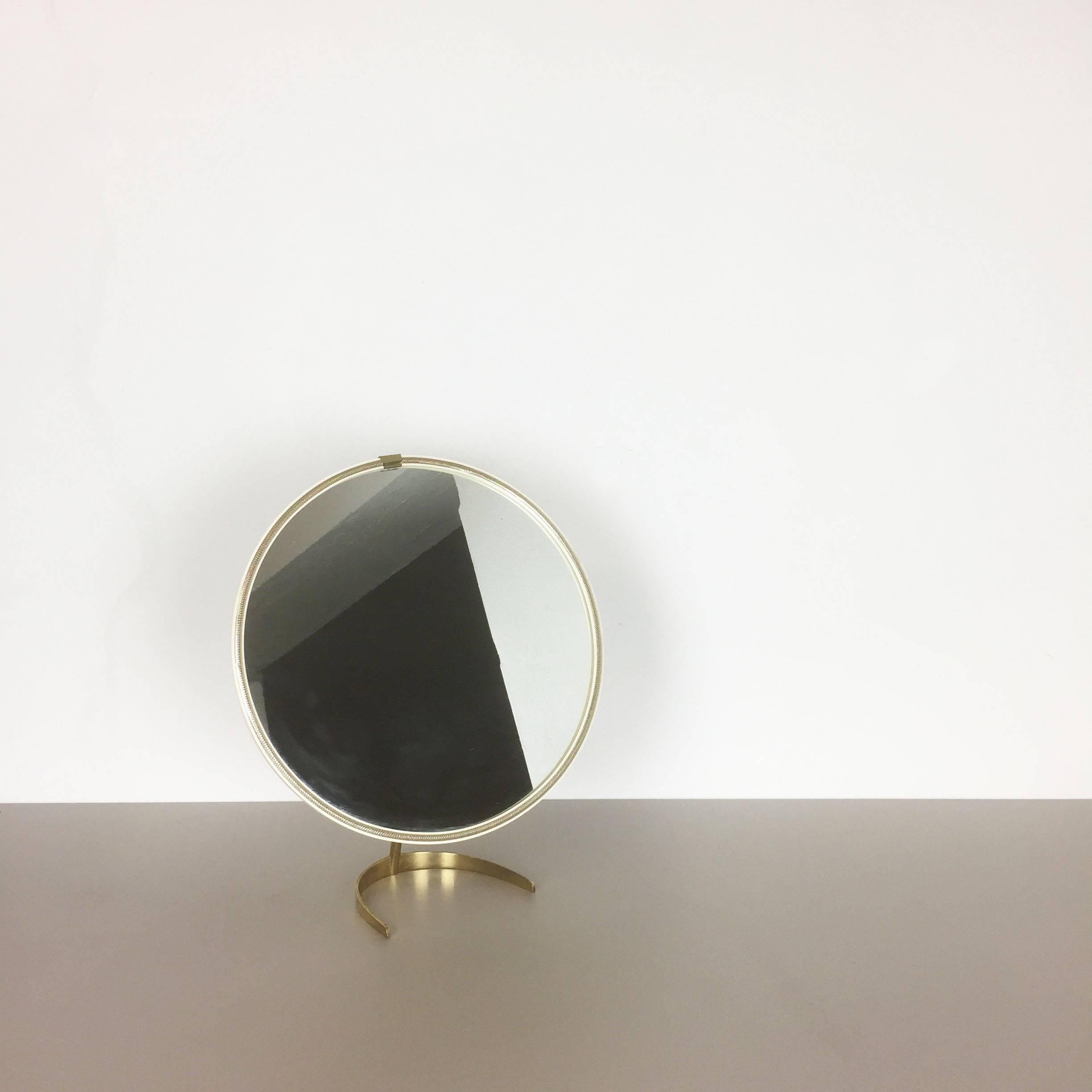 Article:

table mirror


Producer:

Vereinigte Werkstätten München attrib.


Origin:

Germany


Material:

Wood, glass, metal


Decade:

1950s


Description:

this original Midcentury table mirror was produced in the 1950s