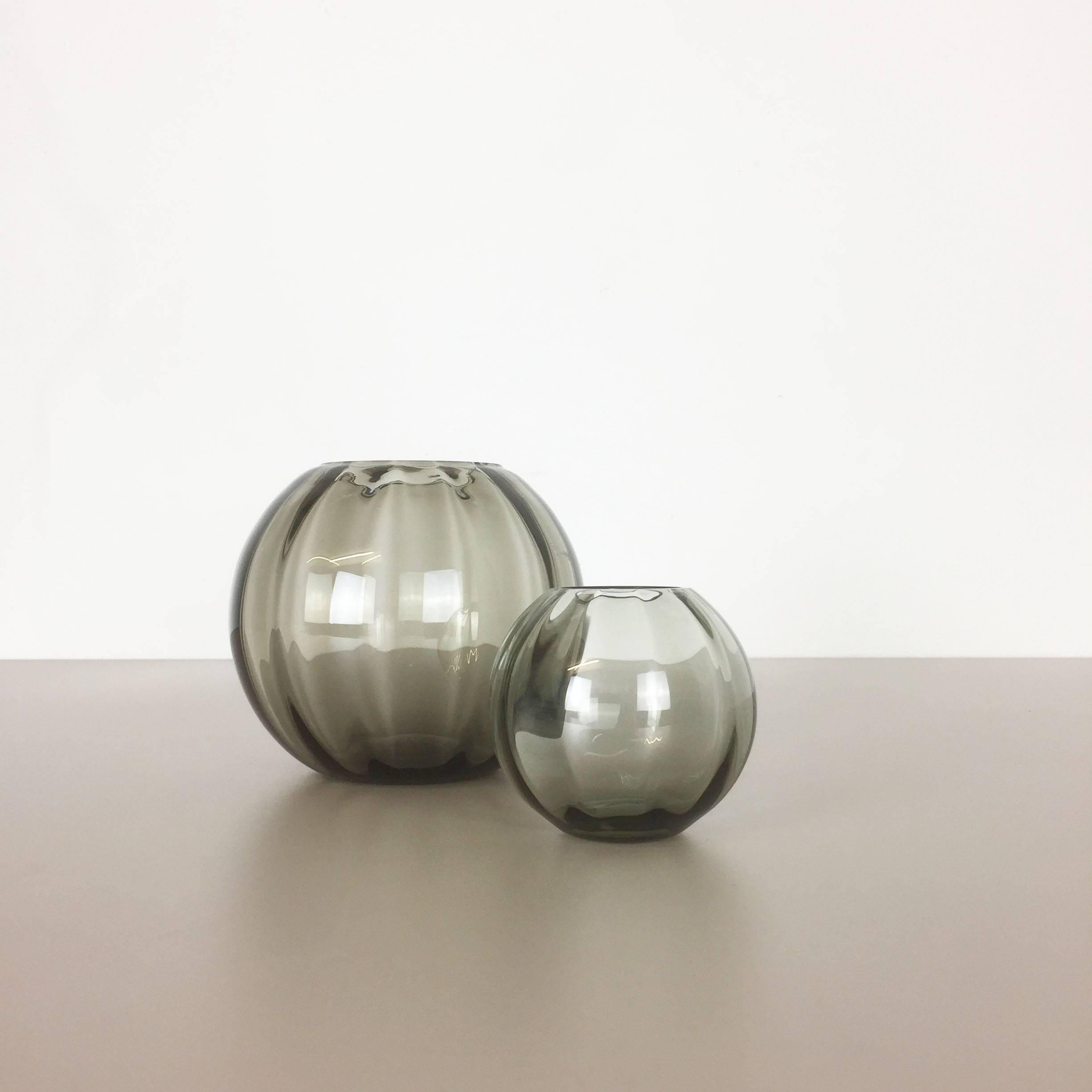 Article:

Set of two Turmalin vases


Producer:

WMF, Germany


Design:

Prof. Wilhelm Wagenfeld Bauhaus 



Decade:

1960s




original vintage 1960s set of two vases of the Wagenfeld Turmalin series. these two vase are