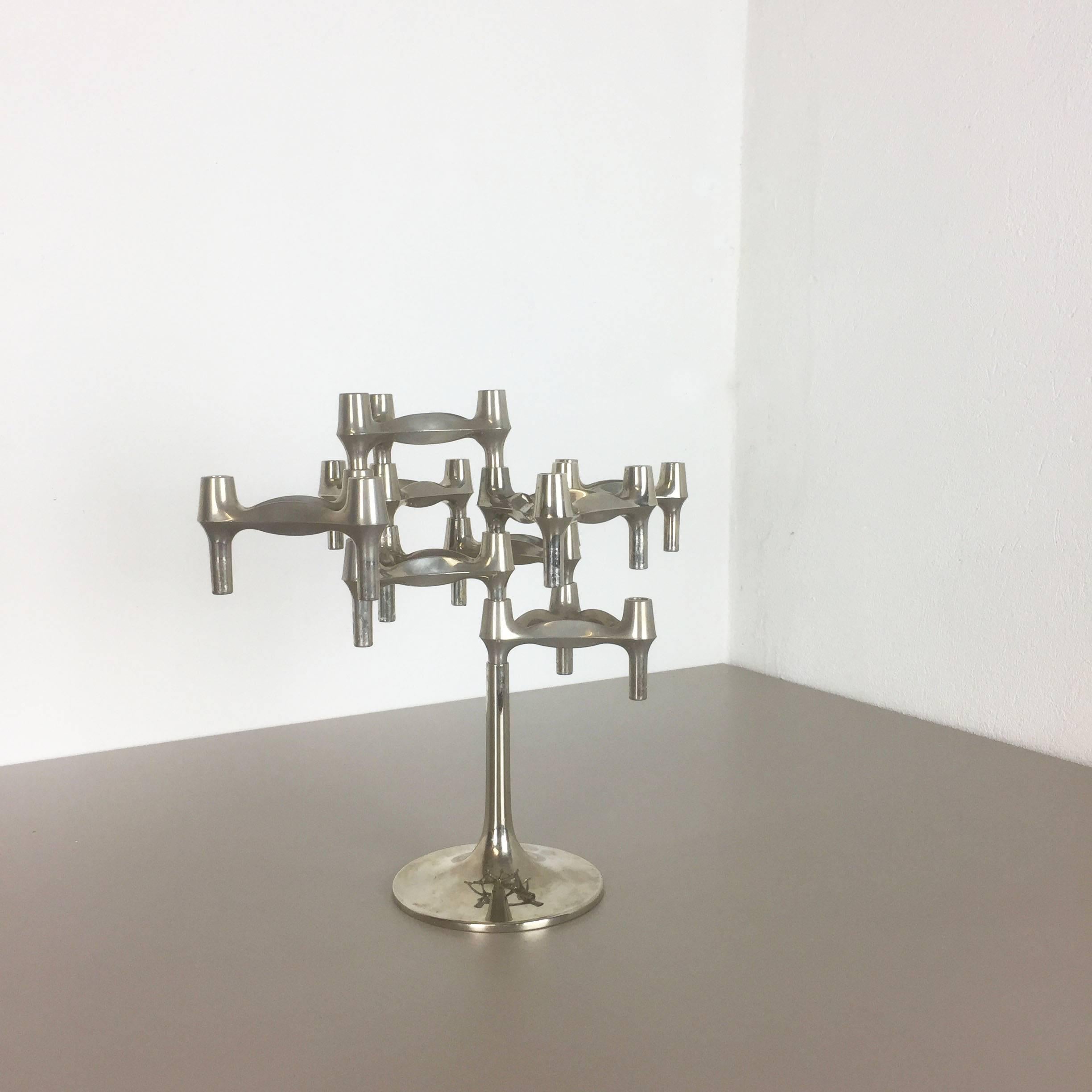 Article:

Metal candleholder sculpture


Producer:

BMF Nagel, Germany


Design:

Caesar Stoffi


Description:

This original vintage set of 8 metal candle holders and a super rare tulip base element, was produced in the 1970s in