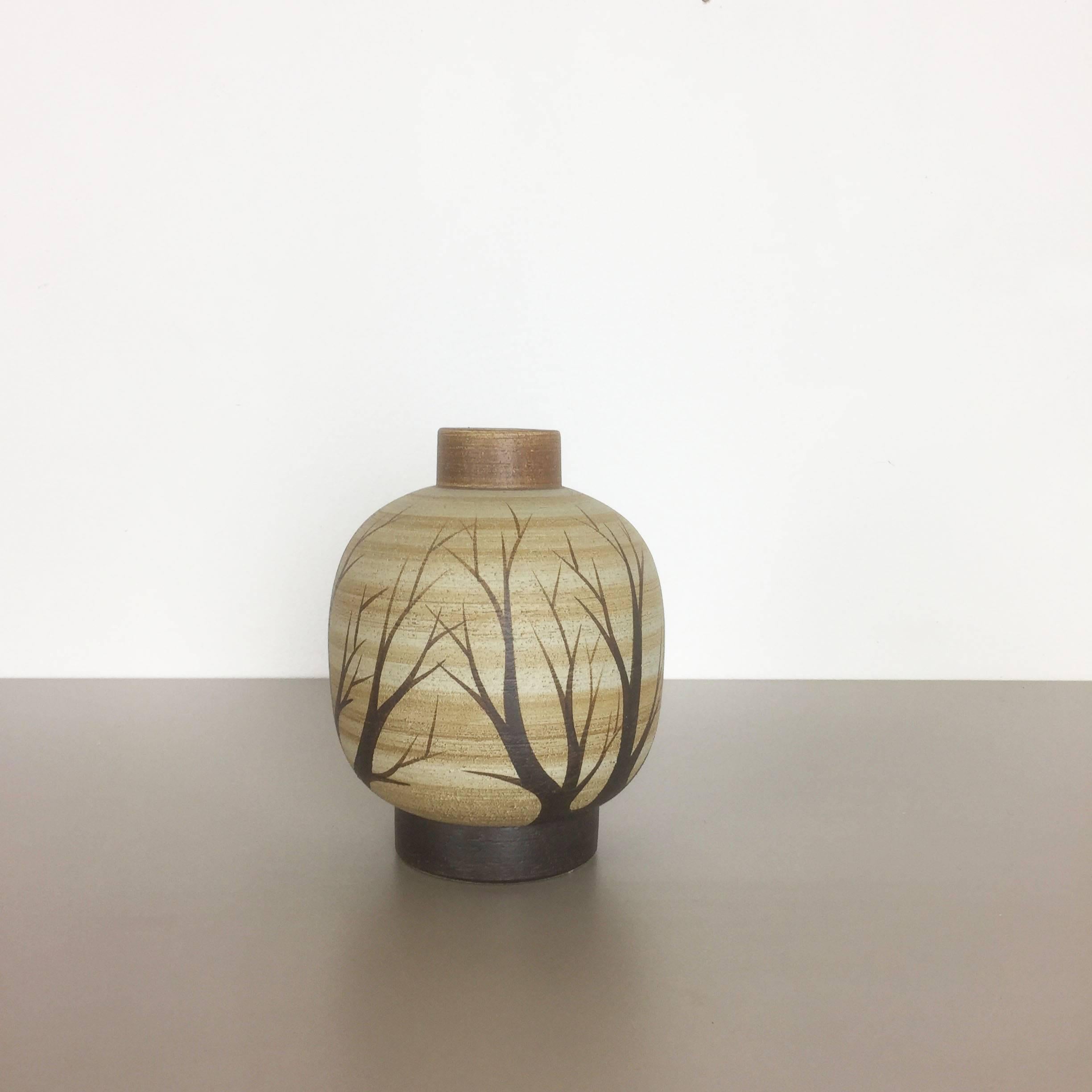 Article:

Pottery ceramic vase


Producer:

Sgrafo Modern, Germany


Design:

Peter Müller



Decade:

1960s


Description:

Original vintage 1960s pottery ceramic vase in Germany. High quality German production with a nice