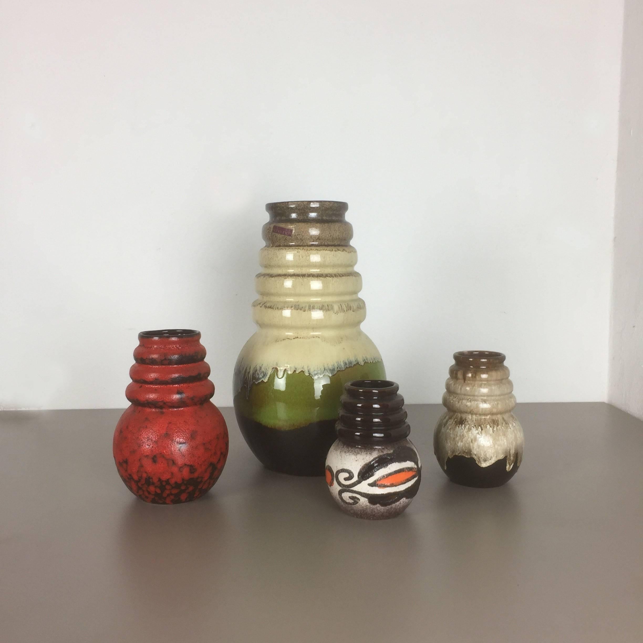 Article:

Set of four fat lava art vases

Model: Vienna

Producer:

Scheurich, Germany



Decade:

1970s


Description:

These original vintage vases was produced in the 1970s in Germany. it is made of ceramic pottery in fat lava