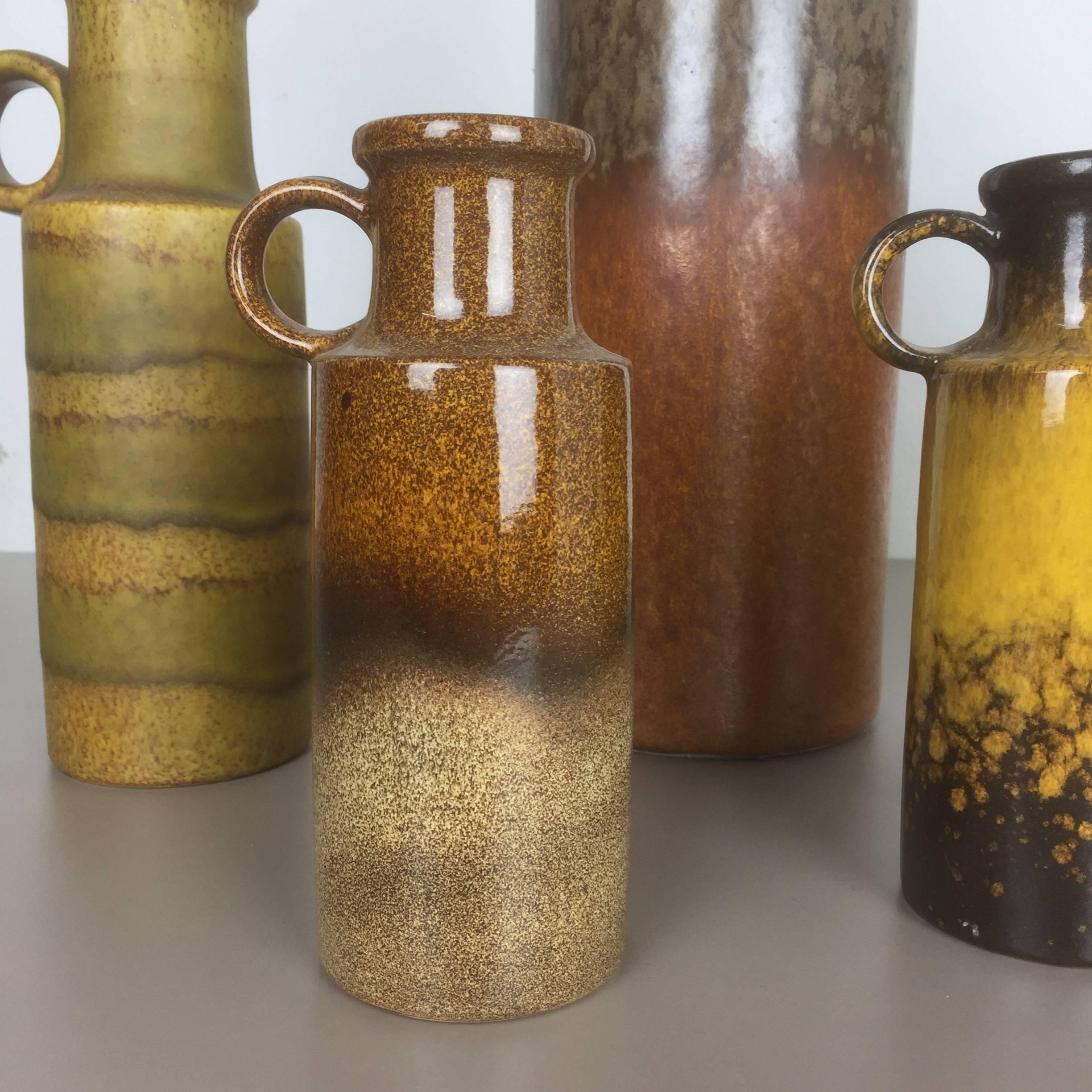 Article:

Set of six Fat Lava art vases


Producer:

Scheurich, Germany



Decade:

1970s


Description:

These original vintage vases was produced in the 1970s in Germany. It is made of ceramic pottery in Fat Lava optic. Super