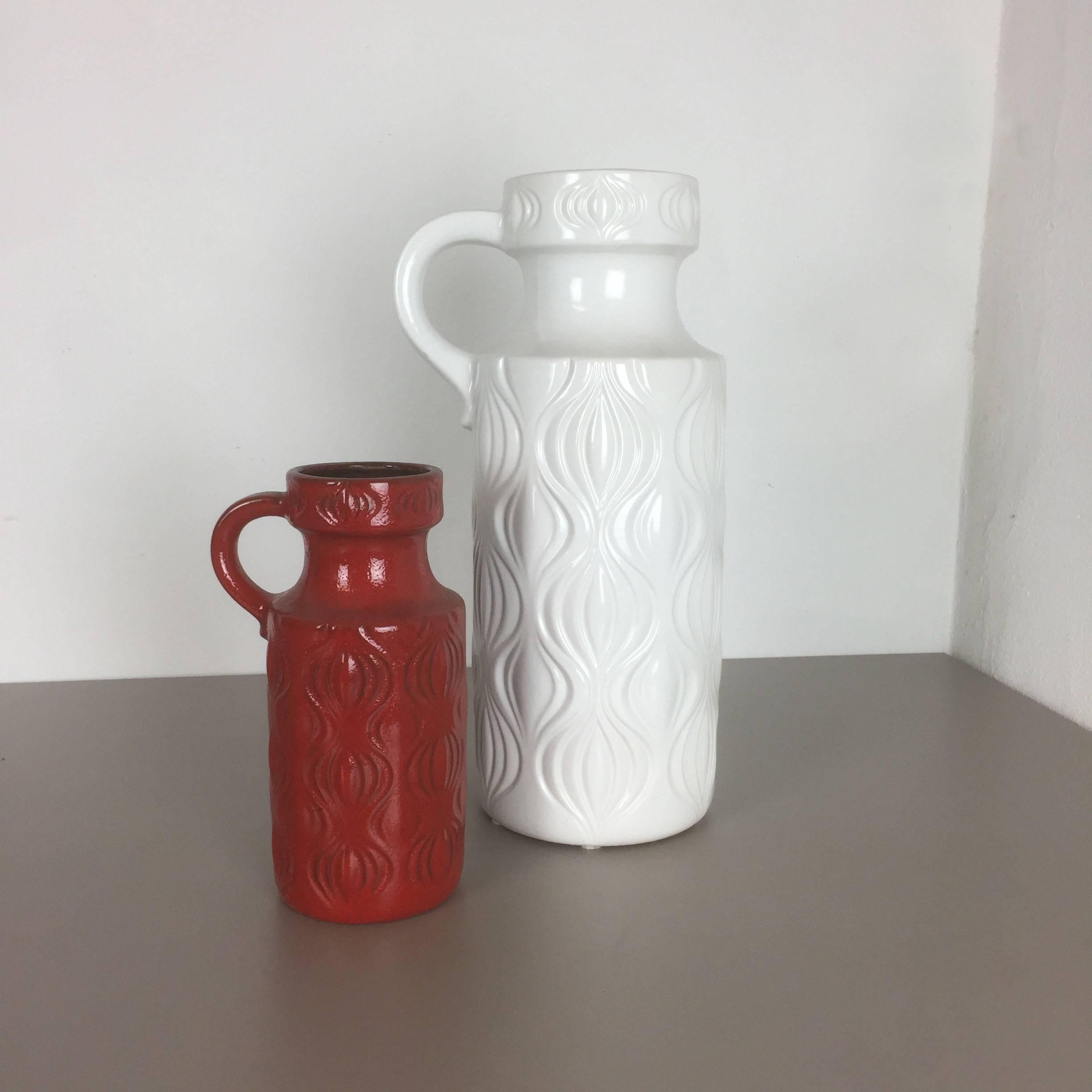 Article:

Set of two fat lava art vases

Model: Vienna

Producer:

Scheurich, Germany



Decade:

1970s


Description:

These original vintage vases was produced in the 1970s in Germany. It is made of ceramic pottery in fat lava