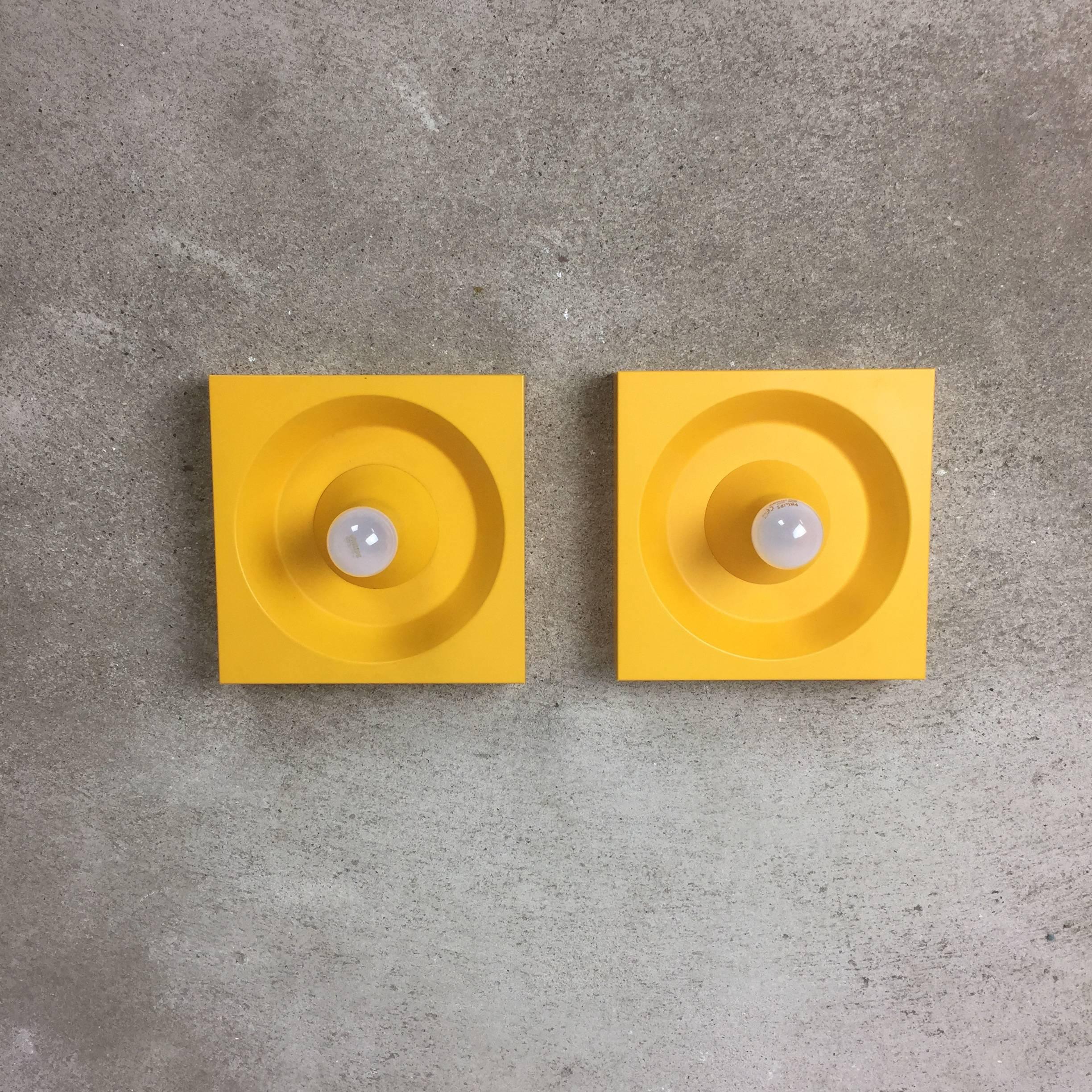 Article:

wall light set of two

Producer:

Kaiser Leuchten

Design:

Klaus Hempel

Origin:

Germany

Age:

1970s

An original yellow wall light designed by Klaus Hempel in the 1970s and produced by Kaiser Leuchten in Germany in the same decade.