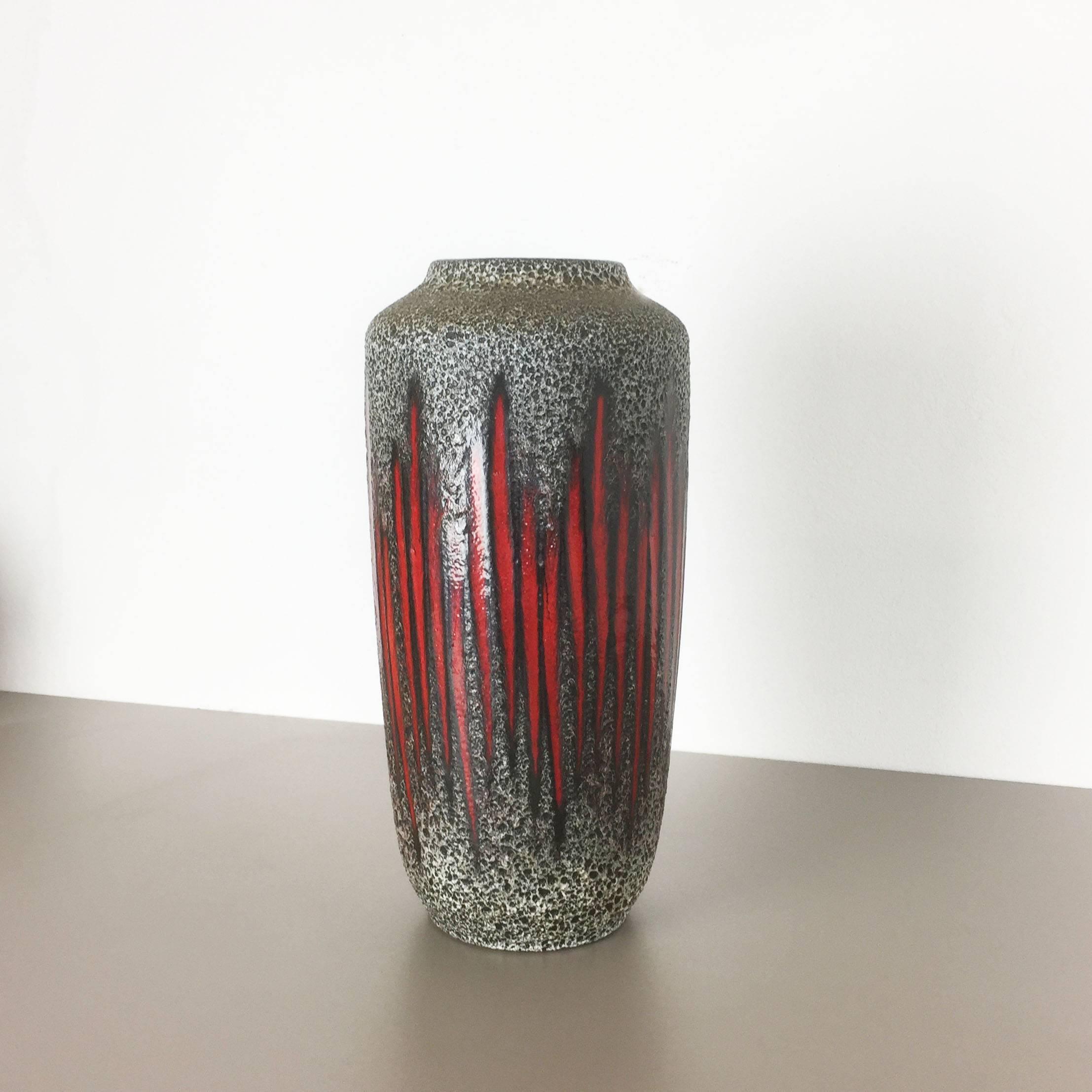Article:

Extra large fat lava art vase. 

Measures: 45cm



Model: 

517 45



Producer:

Scheurich, Germany



Decade:

1970s


        

This original vintage vase was produced in the 1970s in Germany. it is made of