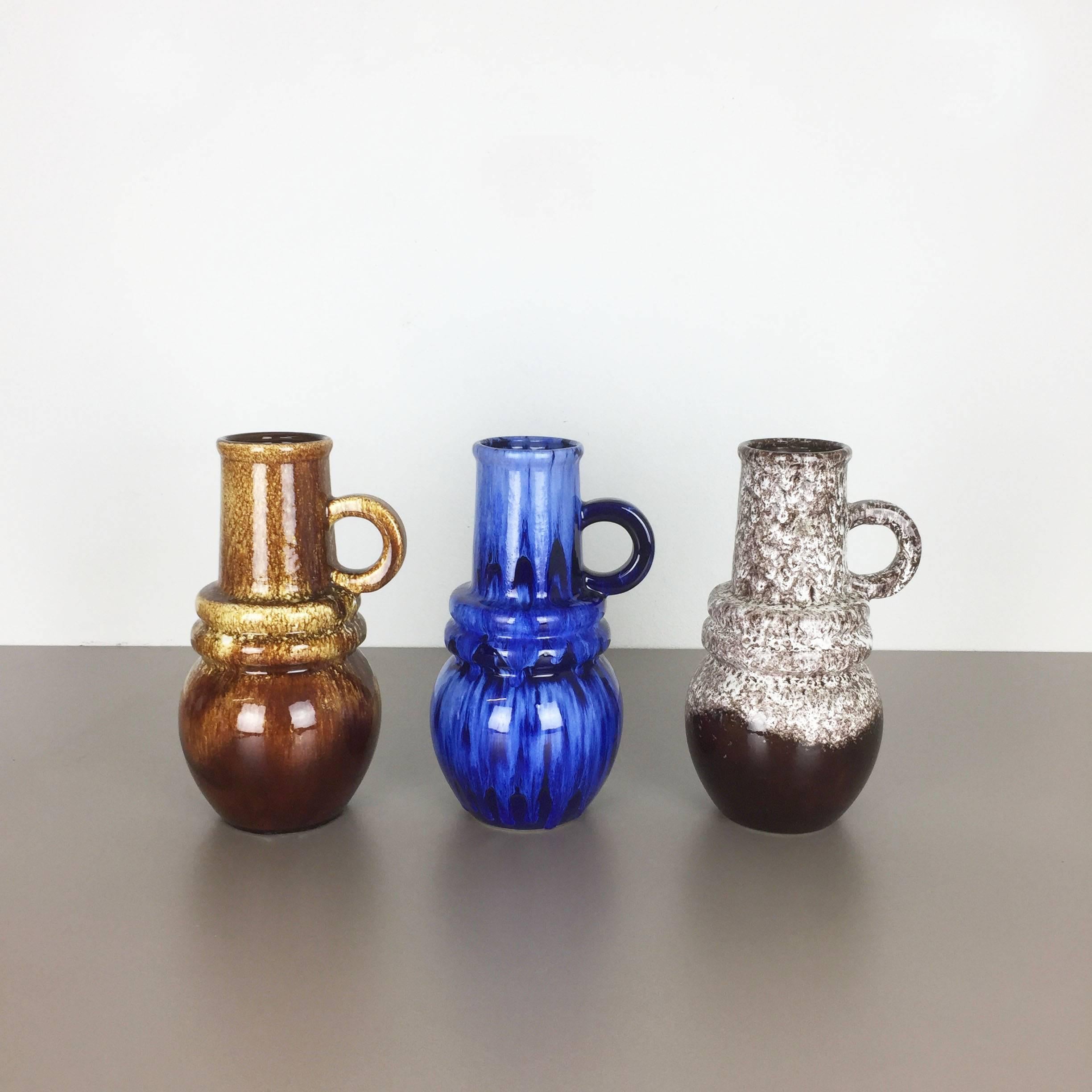 Article:

Set of three fat lava art vases

Model: Vienna
428 26

Producer:

Scheurich, Germany



Decade:

1970s


Description:

These original vintage vases was produced in the 1970s in Germany. It is made of ceramic pottery in