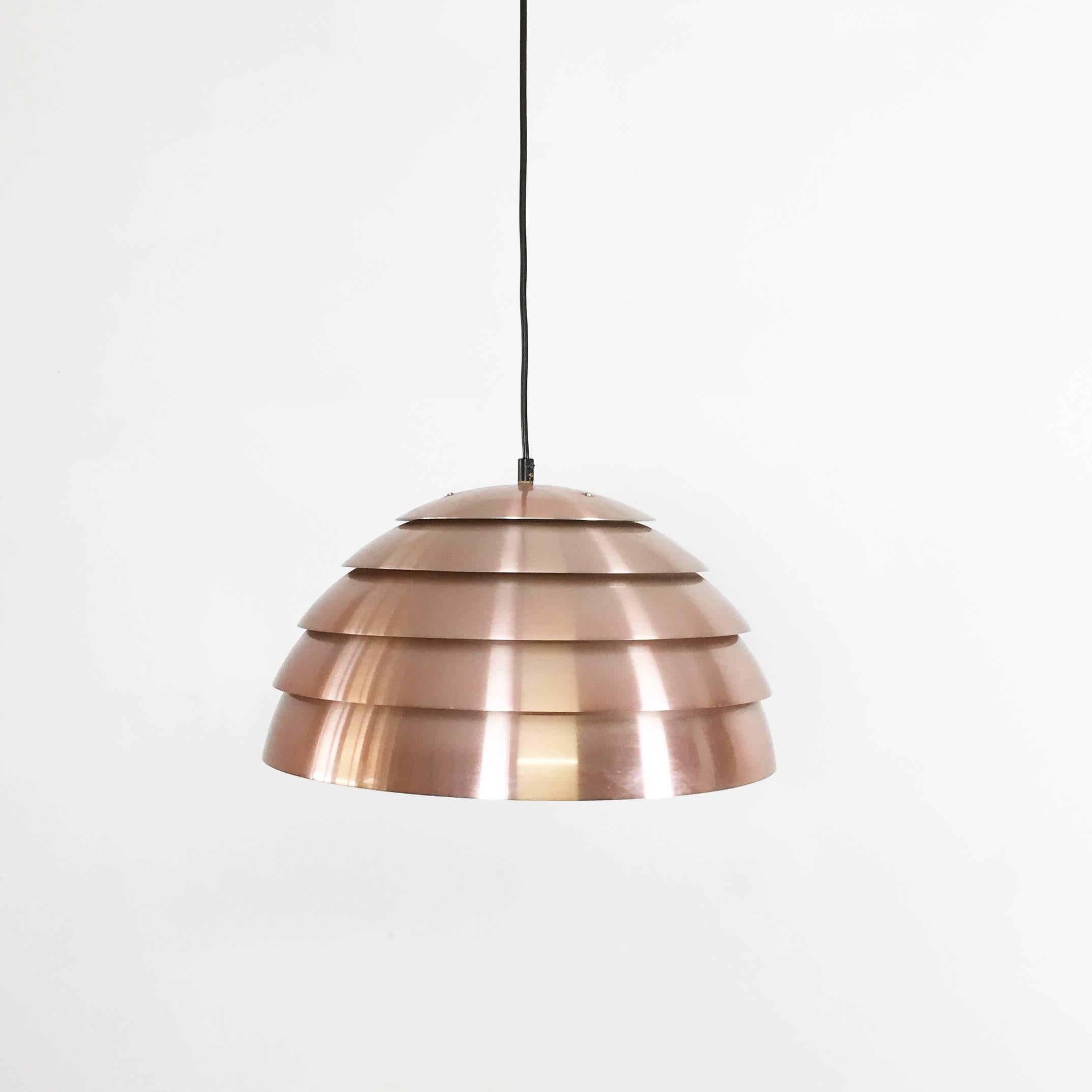 Copper pendant light by Hans-Agne Jakobsson.

Producer Hans-Agne Jakobsson A.B. Markaryd, Sweden.

1960s.

This pendant light was designed by Hans-Agne Jakobsson in the 1950s and produced by his own company, Hans-Agne Jakobsson A. B. in