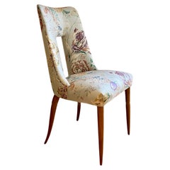 A Mid-Century Sculptural Italian Chair, floral upholstery, circa 1950's