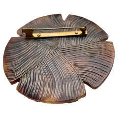 A Line Vautrin Flower Brooch, Mid-Century coloured mirrored glass and Talossel