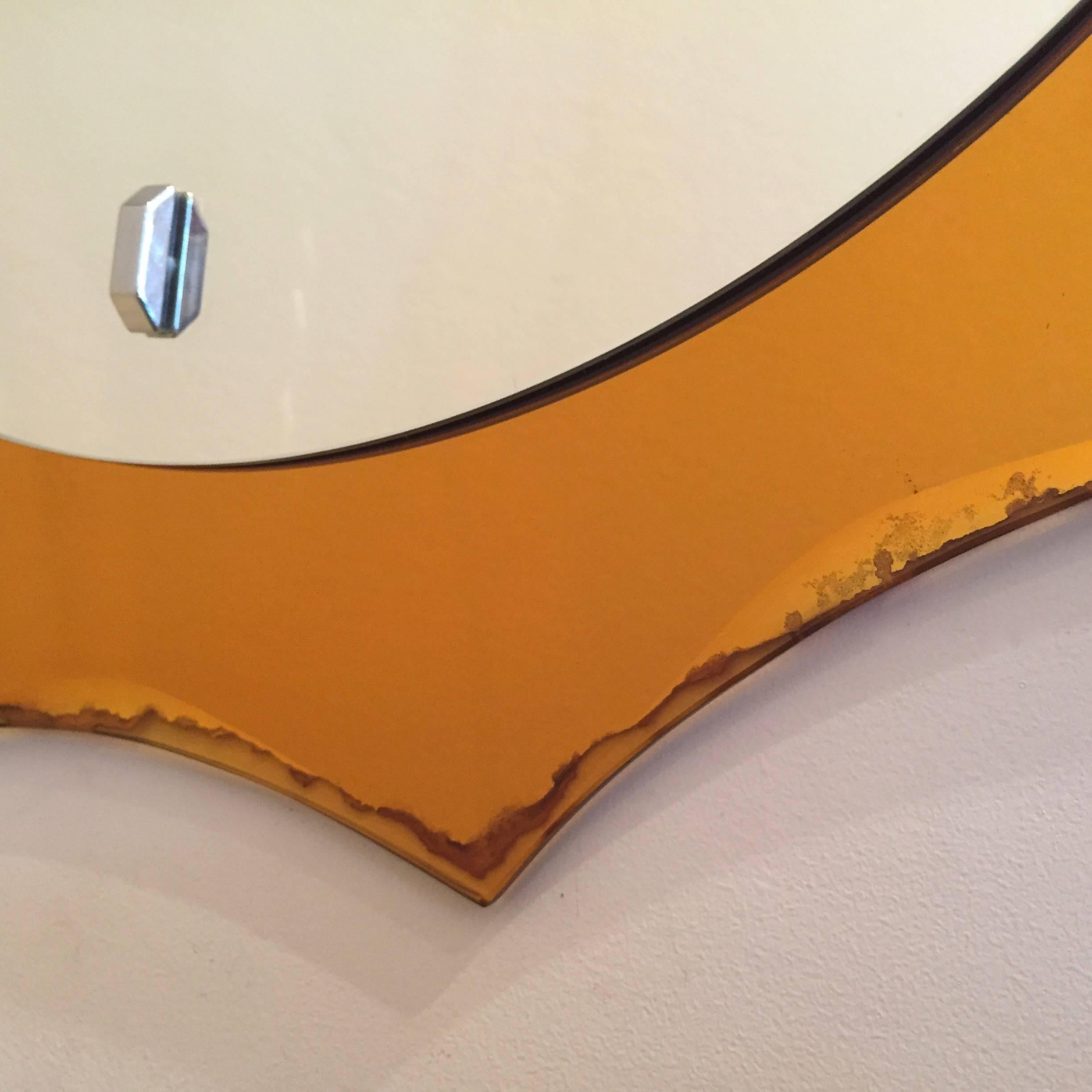 Mid-Century Italian wall mirror with a plain mirrored center and a bright orange mirrored frame, vintage, from the 50's