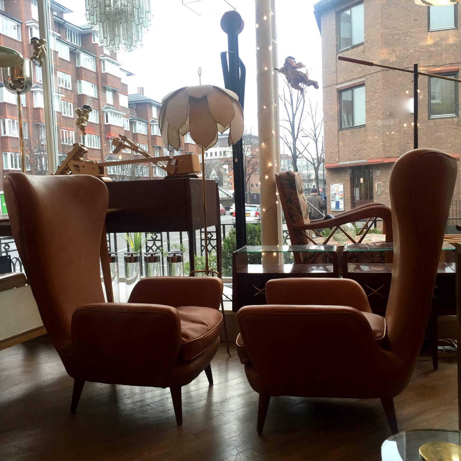 Mid-Century Modern Unusual Mid-Century Tan Leather lounge chairs, Pair