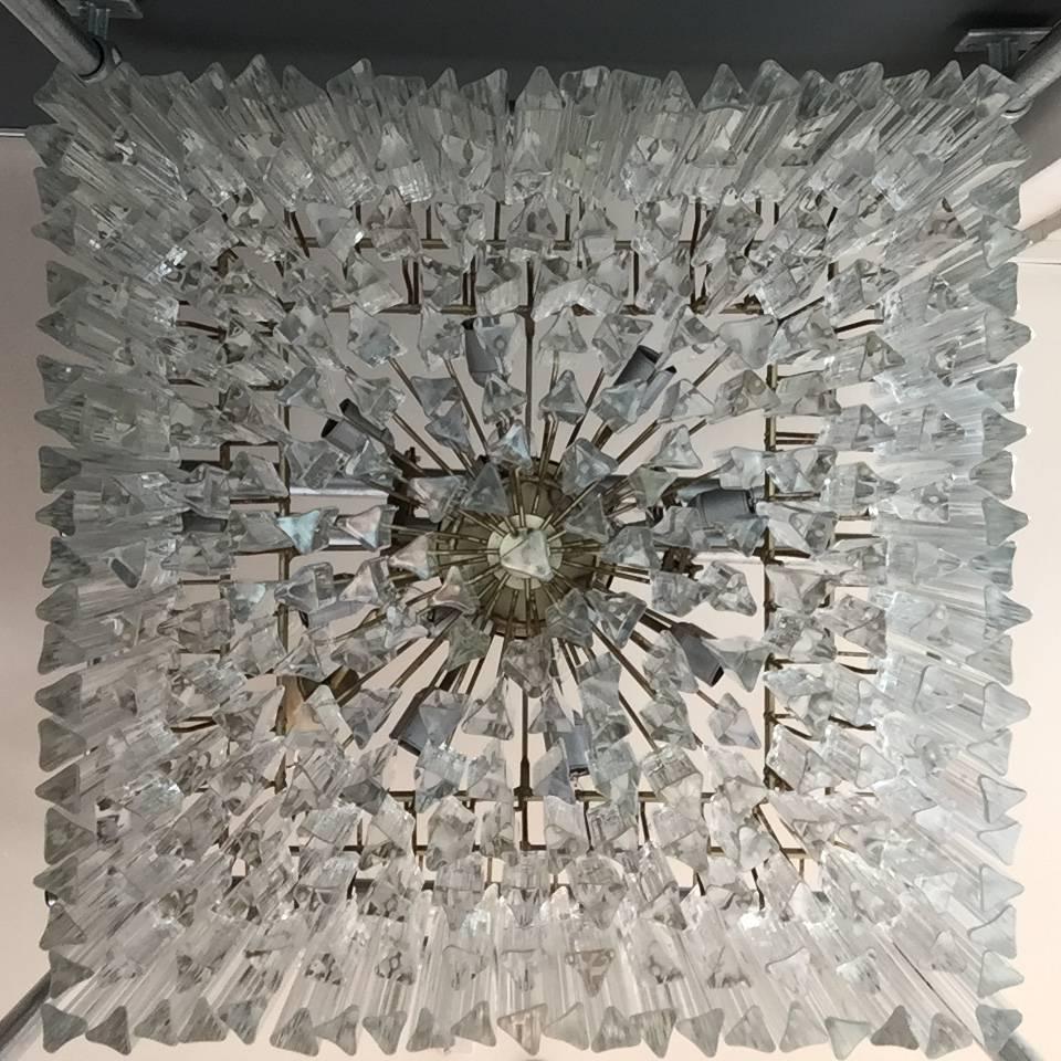this is an impressive pair of large square Venini Murano glass chandeliers with original heavy old lead crystal drops as well as the original frames.