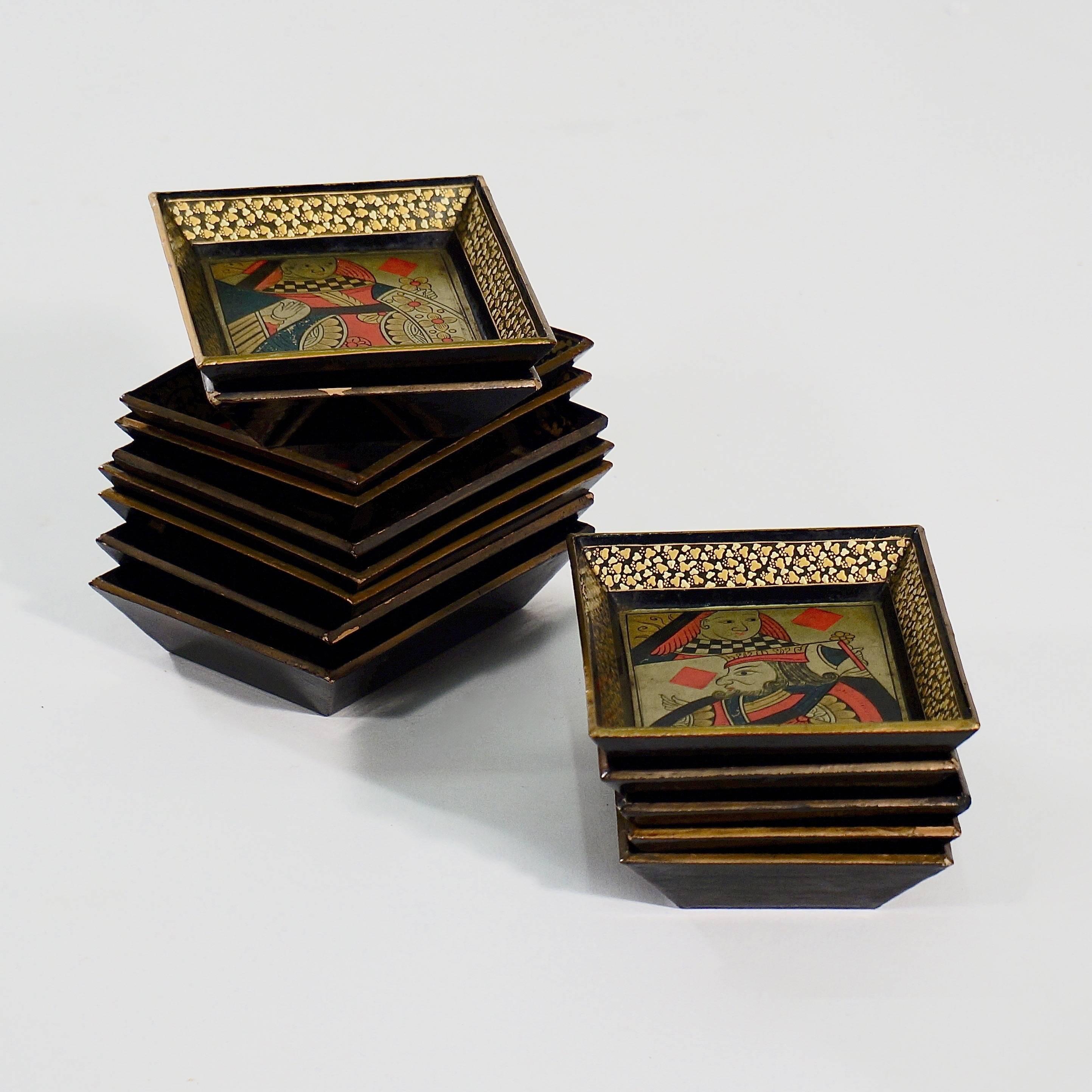 Each with painted, gilt and lacquered decoration depicting face cards or text.

England, late 19th century.

Priced individually.