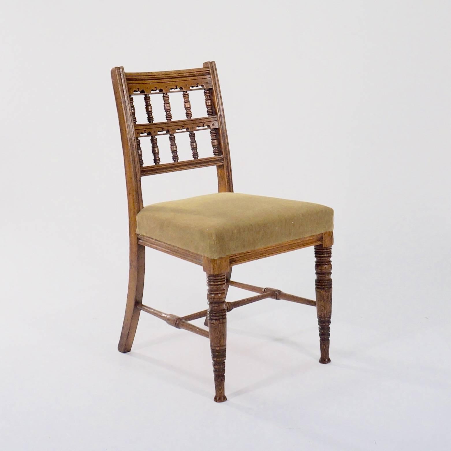Aesthetic Movement Set of Four Carved Oak Side Chairs by Bruce Talbert