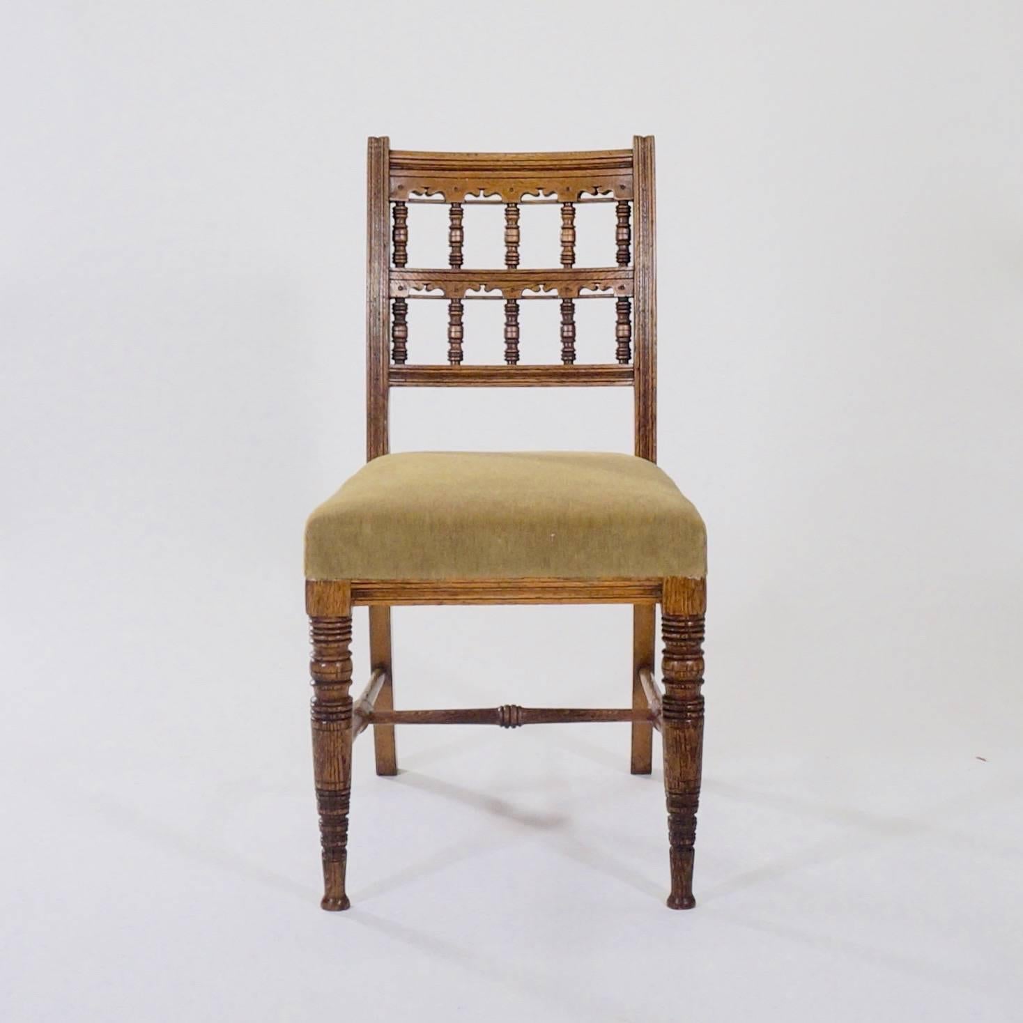 English Set of Four Carved Oak Side Chairs by Bruce Talbert