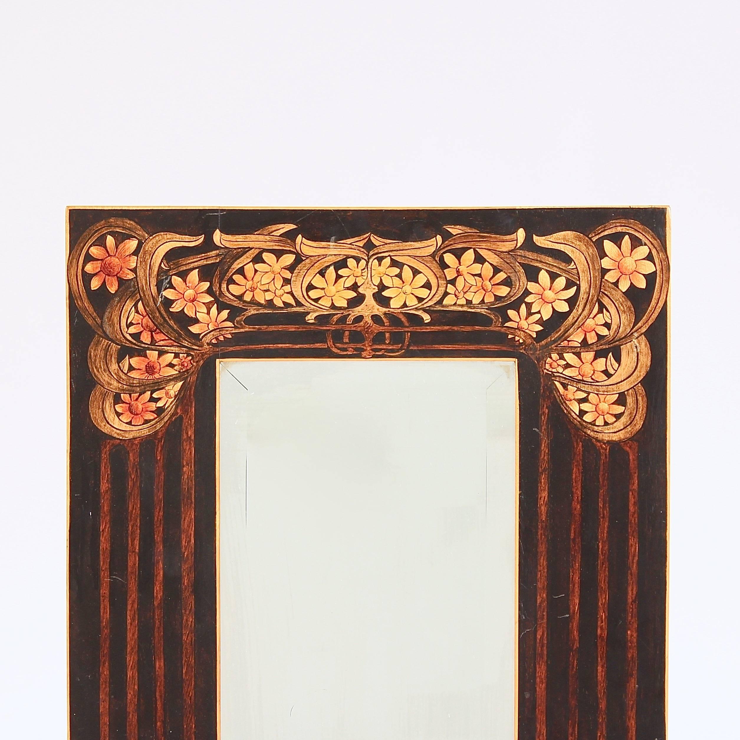 The stained wood frame with floral and line decoration with a boxwood fillet and bevelled plate,

England, circa 1895.