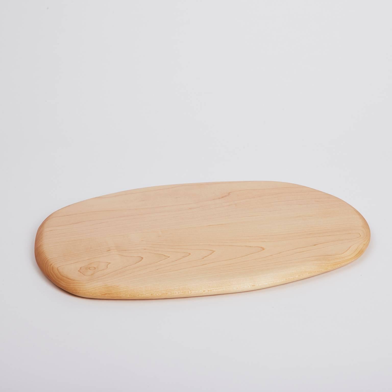 Handcrafted in Brooklyn, Noah Spencer carefully selects wood with beautiful grain patterns to create each Pebble Cutting Board. These sculptural and functional objects are great for simple kitchen cutting and artful food presentation. 

Materials: