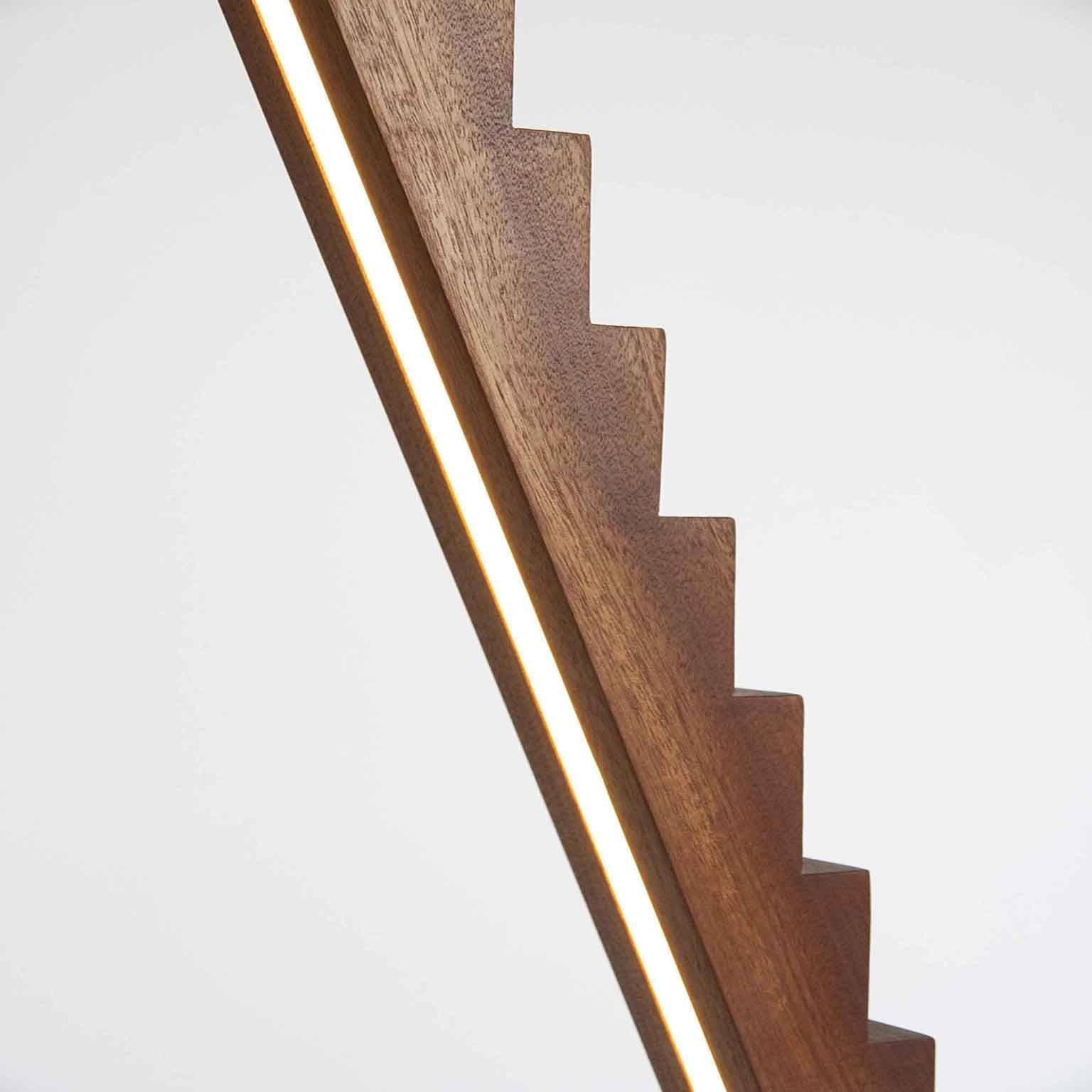 Fort Makers' Sapele Stepped Line Light is made in Brooklyn by Noah Spencer. This sculptural LED light juxtaposes hard lines with soft reflected light and emits an ambient aura. The lifespan of an LED strip is approximately 50,000 hours.
12 Volts LED