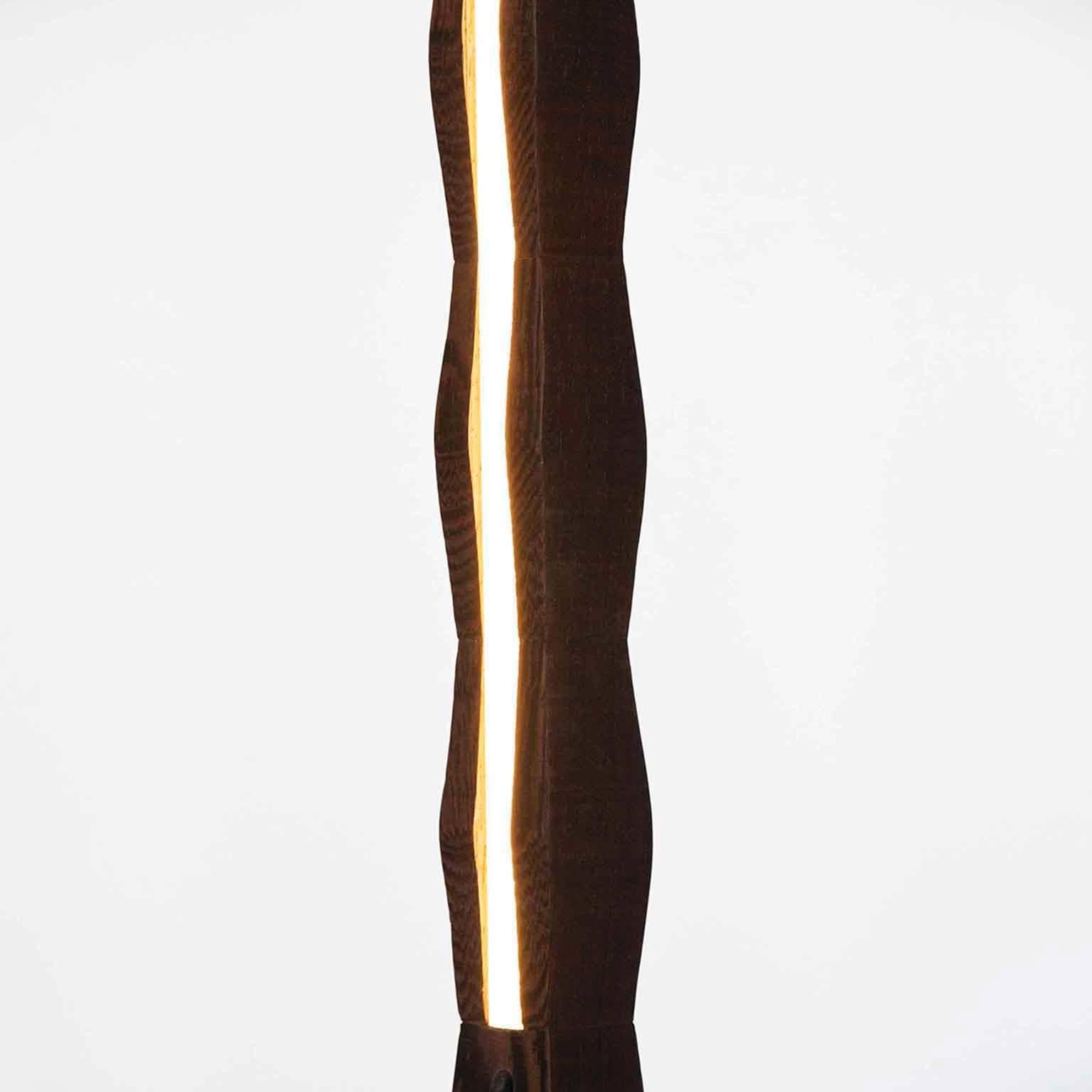 Fort Makers' Column Wenge Line Light is made in Brooklyn by Noah Spencer. This sculptural LED light juxtaposes hard lines with soft reflected light and emits an ambient aura. The lifespan of an LED strip is approximately 50,000 hours.
12 Volts LED