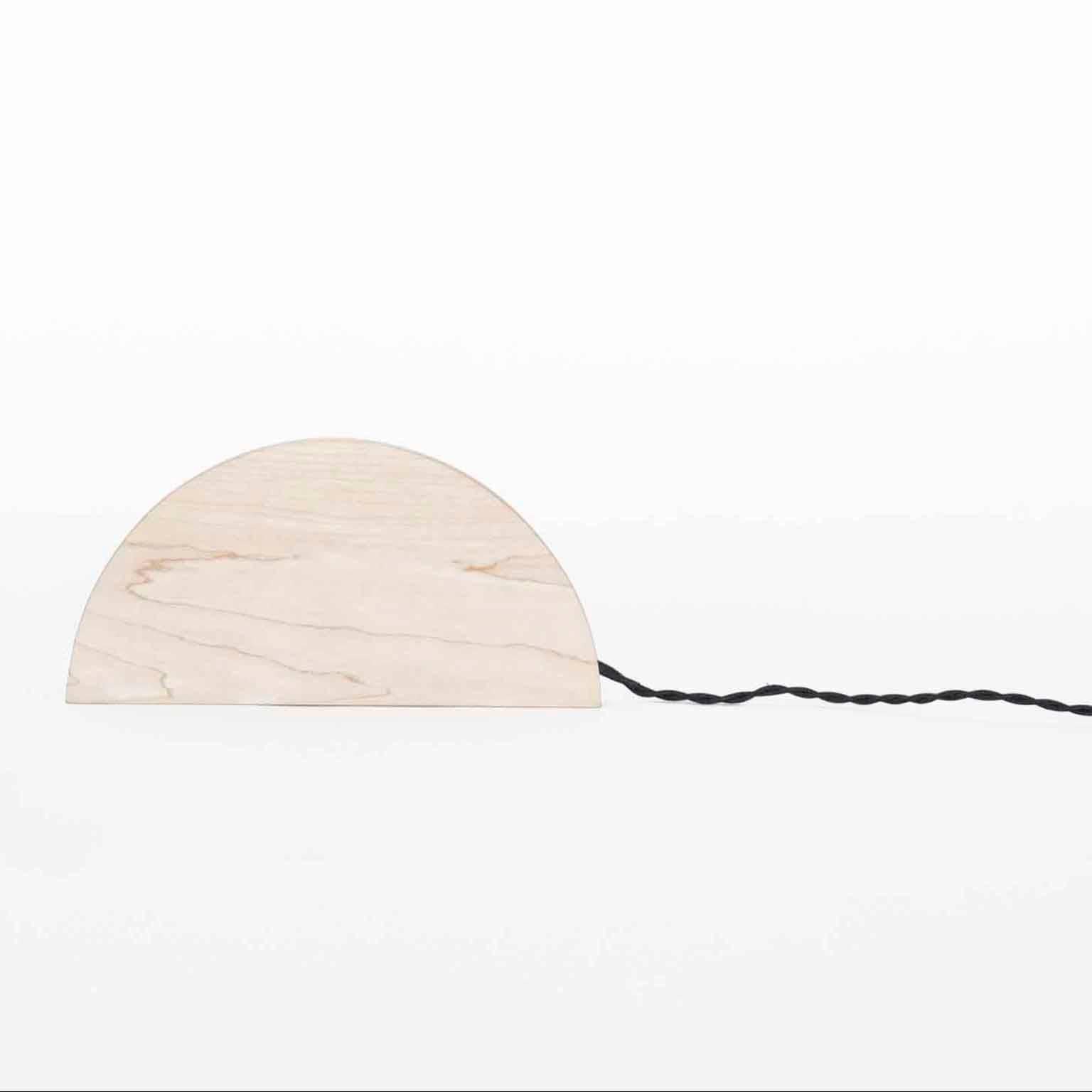Fort Makers' Small Half Moon Maple Line Light is made in Brooklyn by Noah Spencer. This sculptural LED light juxtaposes hard lines with soft reflected light and emits an ambient aura. The lifespan of an LED strip is approximately 50,000 hours.
12
