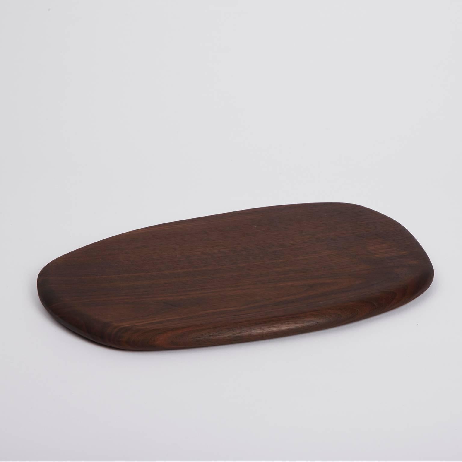 Handcrafted in Brooklyn, Noah Spencer carefully selects wood with beautiful grain patterns to create each Pebble Cutting Board. These sculptural and functional objects are great for simple kitchen cutting and artful food presentation. 

Materials: