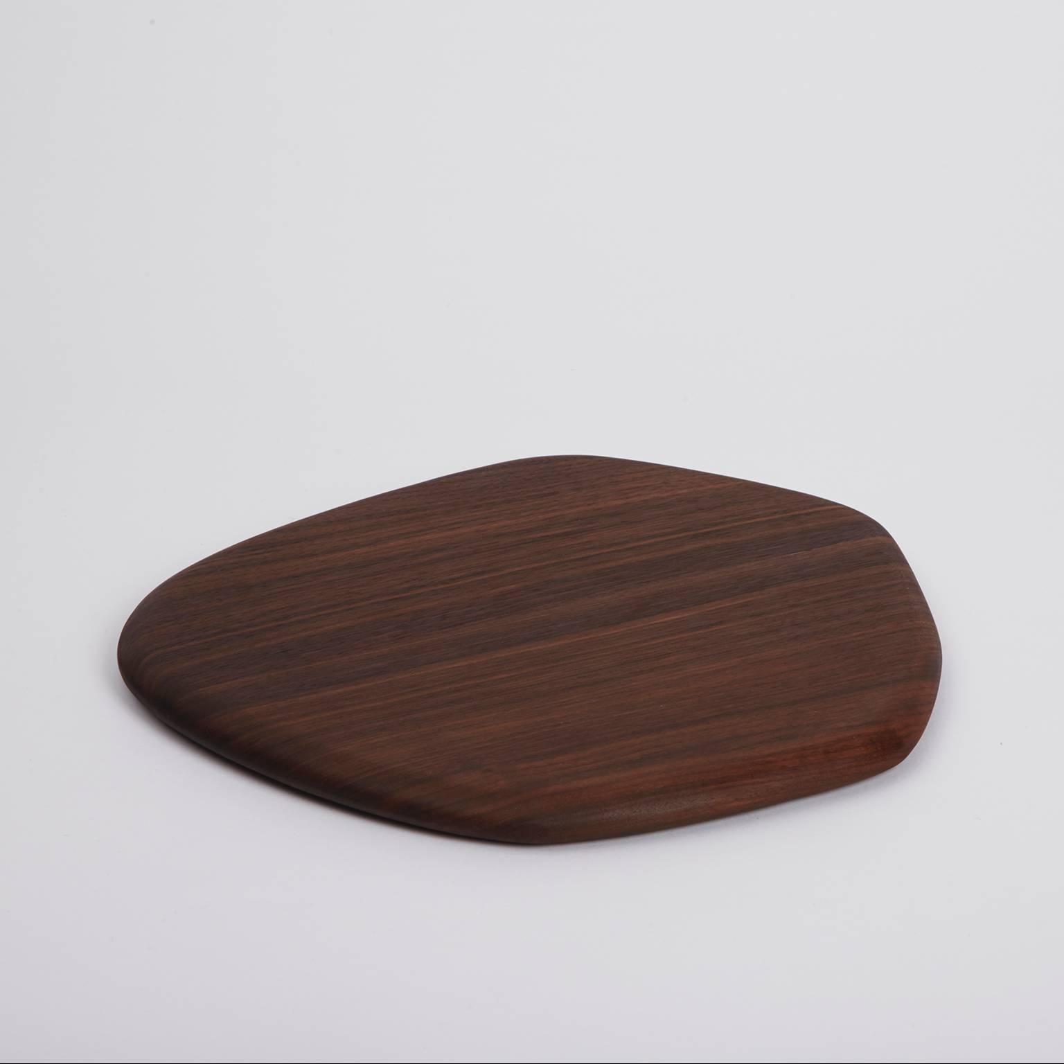 Handcrafted in Brooklyn, Noah Spencer carefully selects wood with beautiful grain patterns to create each Pebble Cutting Board. These sculptural and functional objects are great for simple kitchen cutting and artful food presentation. 

Materials: