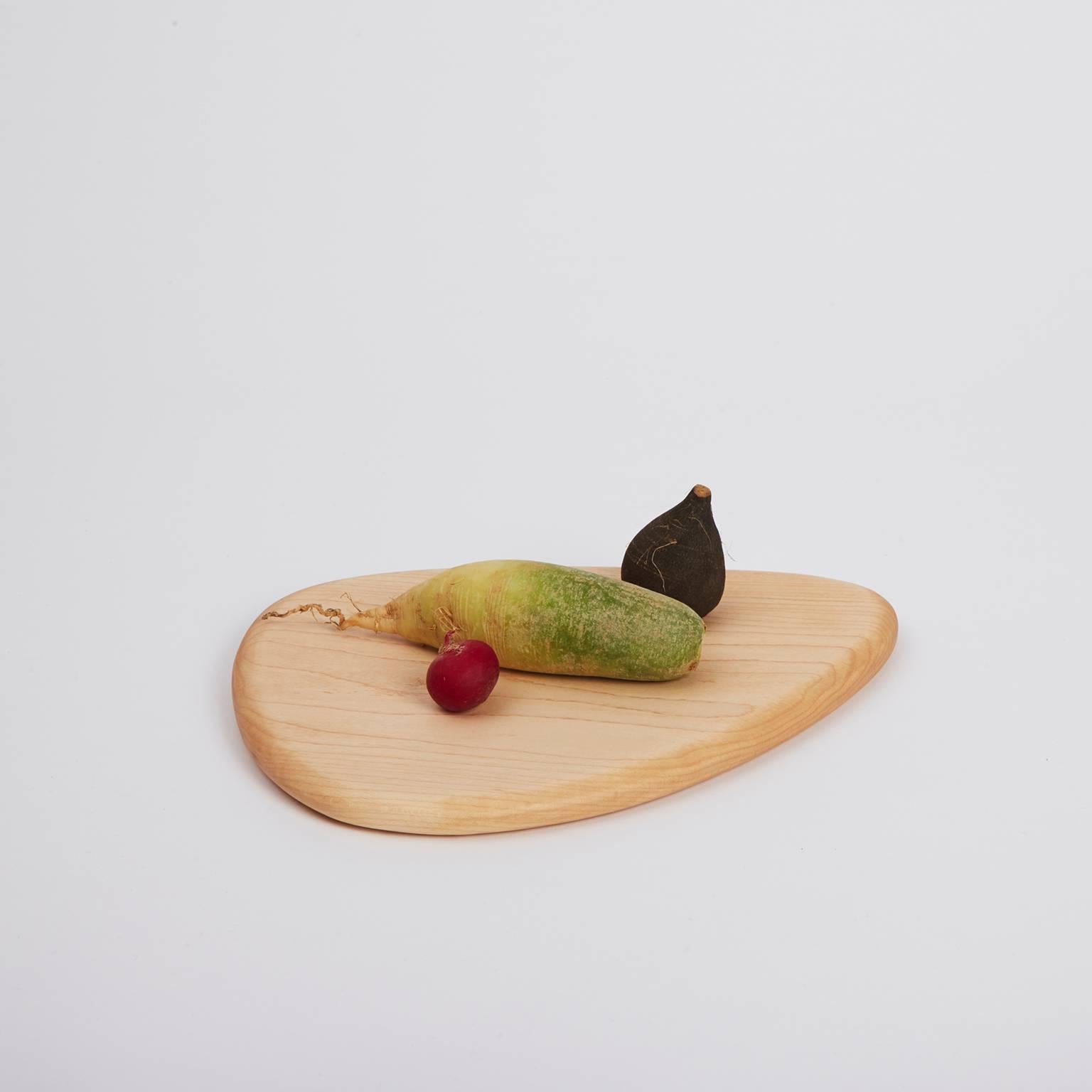 Handcrafted in Brooklyn, Noah Spencer carefully selects wood with beautiful grain patterns to create each Pebble Cutting Board. These sculptural and functional objects are great for simple kitchen cutting and artful food presentation. 

Materials: