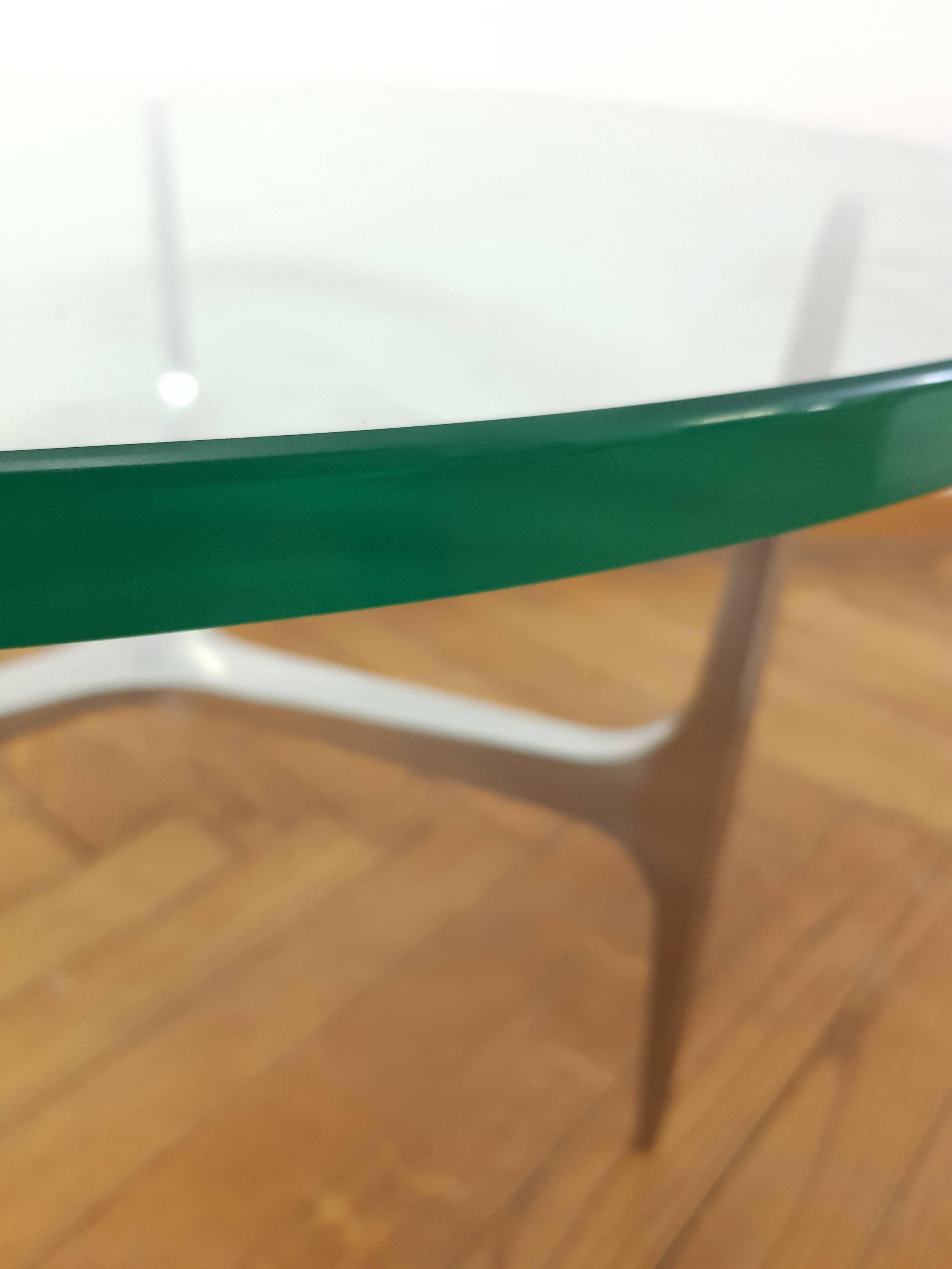 Beautiful coffee table, designed by Knut Hesterberg. It was produced by Ronald Schmitt in Germany in the 1960s. The glass plate is very thick and the solid aluminium legs are high quality.