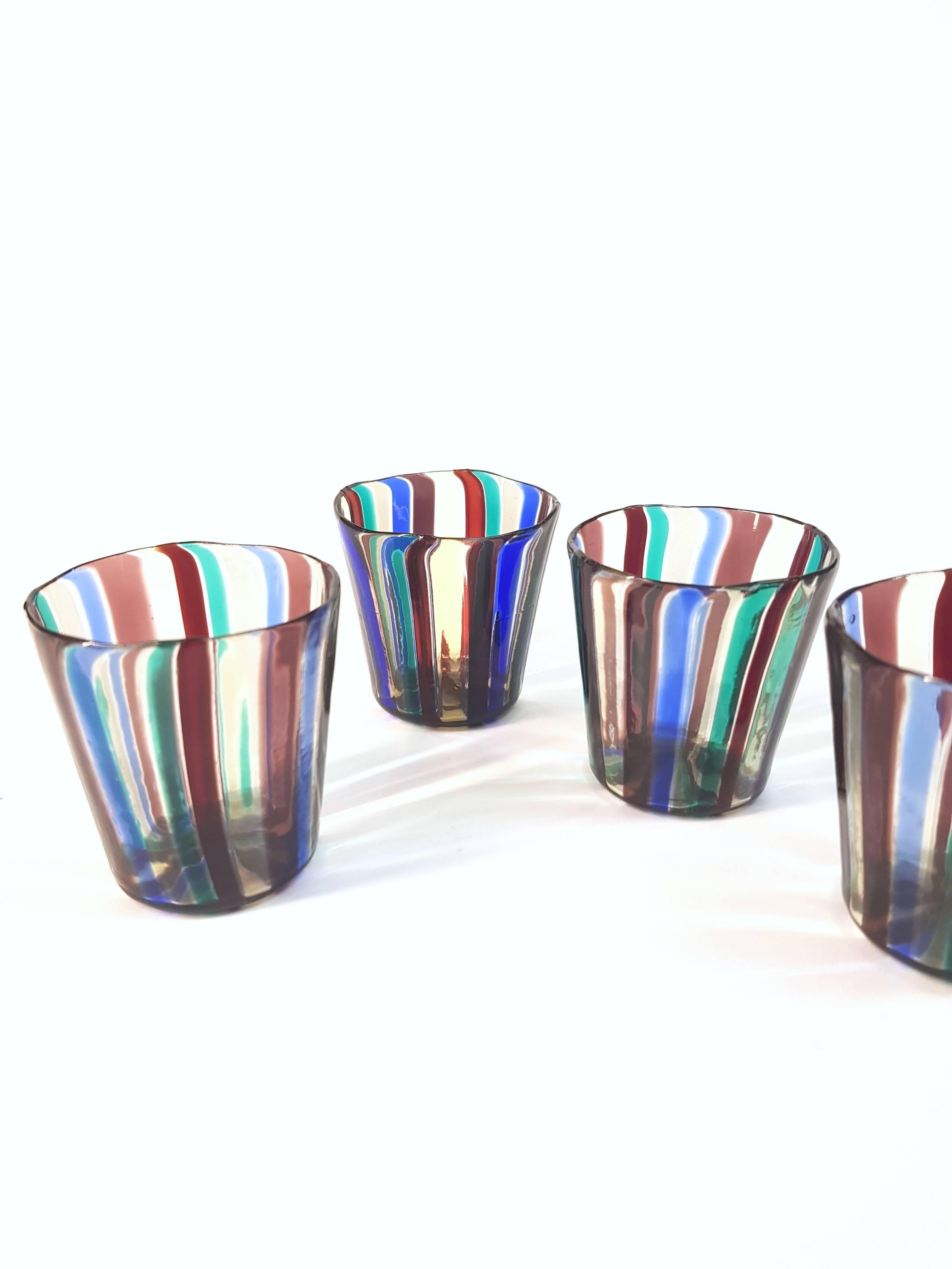 For sale are Gio Ponti glasses, made by Venini in 1950. 
The glasses are in perfect condition. These glasses are not signed - they never signed these small glasses which are meant to get used.
    
