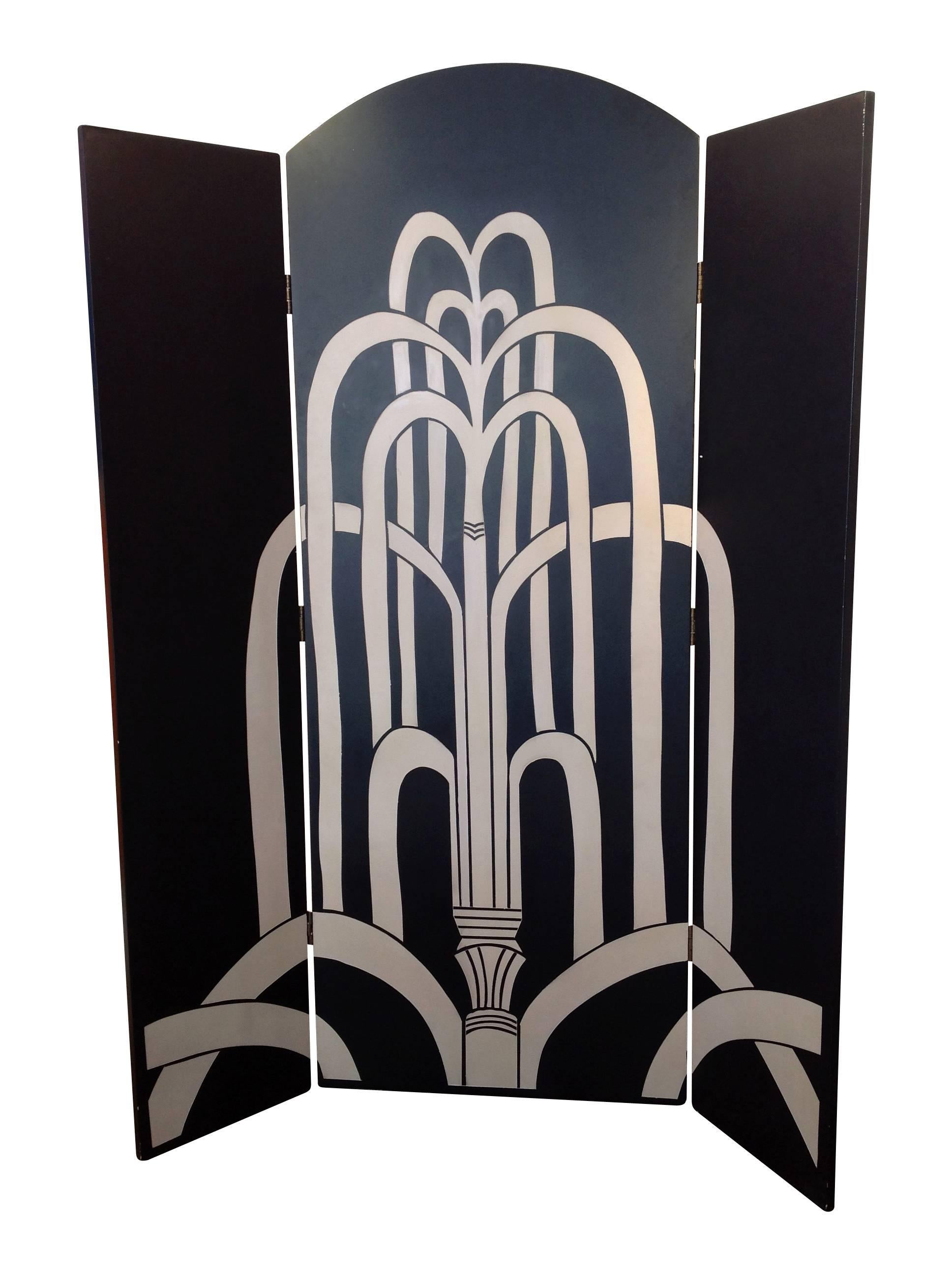 A beautiful screen by Fournier Decoration, Paris comprising three carved wood panels depicting five naked, Art Nouveau, female figures and stylized fountains. 
The front of the screen is hand-painted in colors the back has a monochrome
