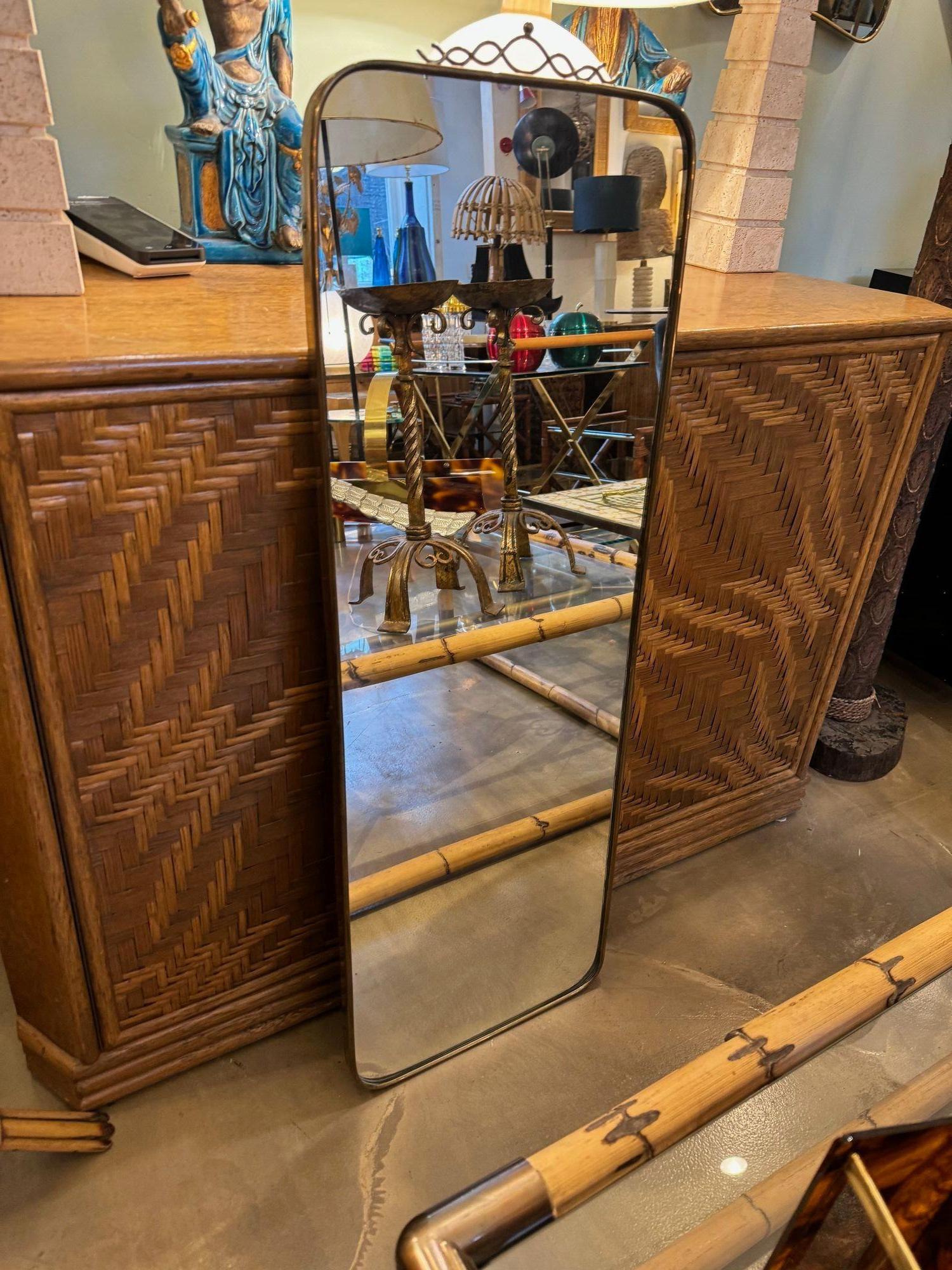 An orignal Italian 1950s brass framed mirror with scroll top detail In Good Condition For Sale In London, GB