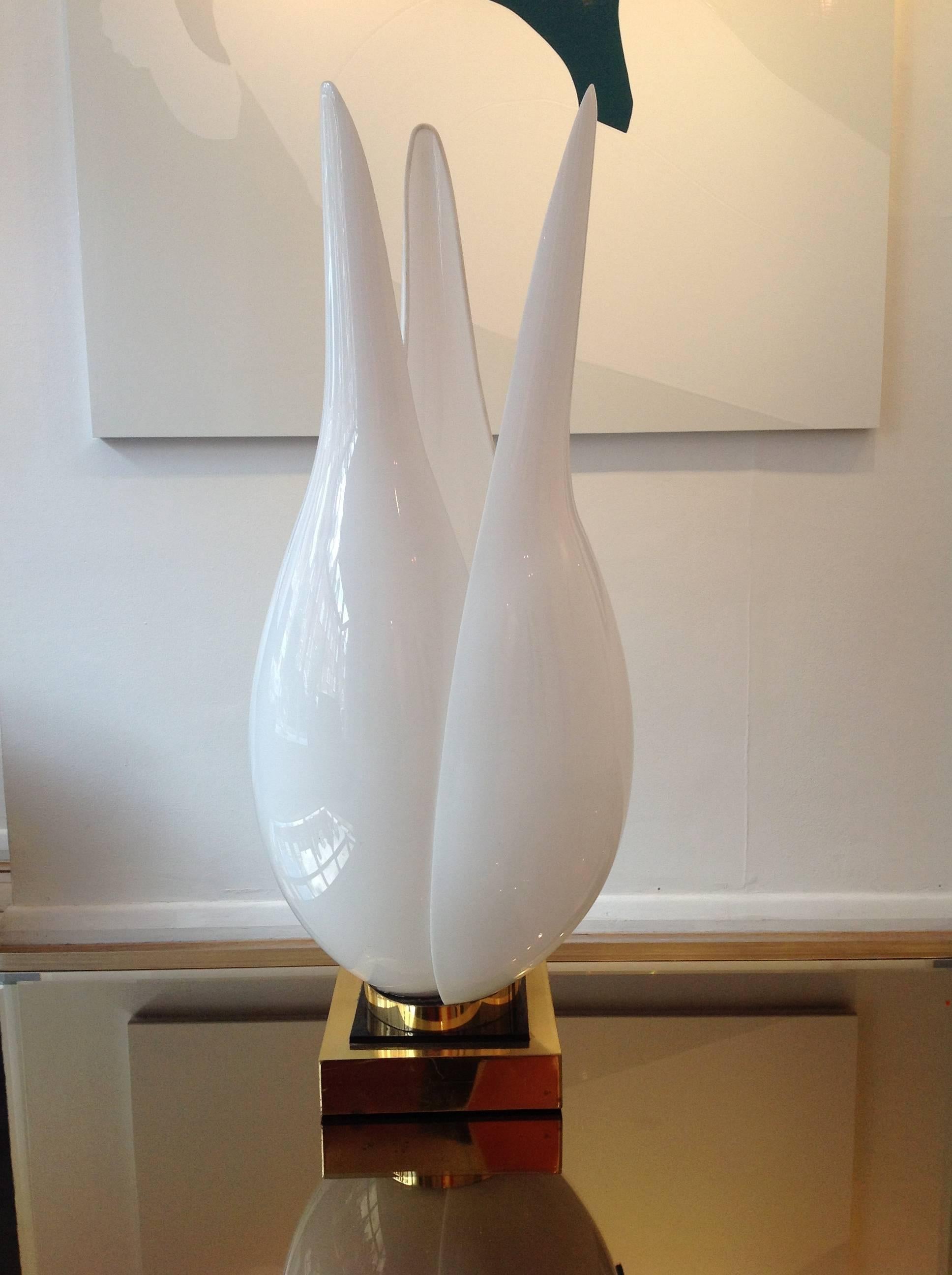 A Rougier Tulip lamp with opaque acrylic tulip head on a brass and black laminate base. Re wired with antiques cord flex and PAT tested for UK fittings. A favourite in terms of set prop in some great Hollywood movies like Scarface.