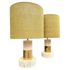 A pair of Studio Smania Italian 1970s travertine and brass lamps