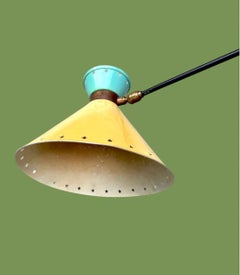 A rare 1950s adjustable enamel and brass wall light "Diablo" by Rene Mathieu