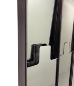 A set of 4 1970s "Gronda" coat hanger mirrors by Luciano Bertoncini for Elco