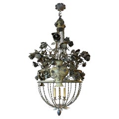 A large 1920s French wrought iron balloon chandelier with vase and flower design